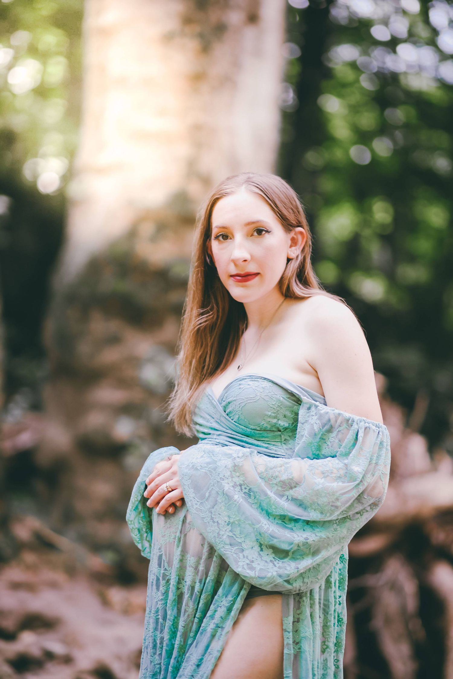 Intimate maternity boudoir session highlighting the beauty of motherhood in soft natural light in York, PA
