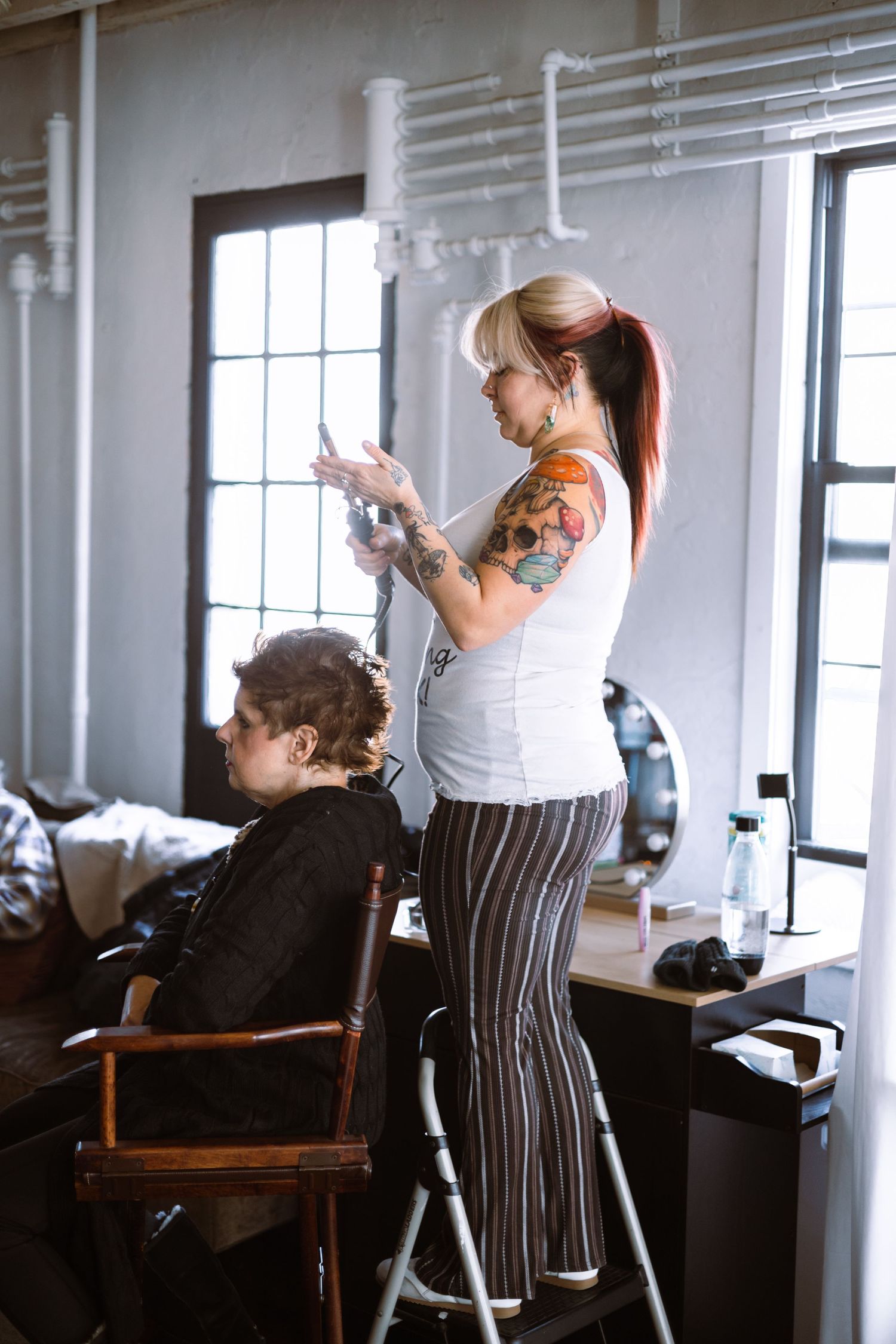 Empowering boudoir experience featuring on-site hair and makeup styling for a confidence-boosting transformation in York, PA studio