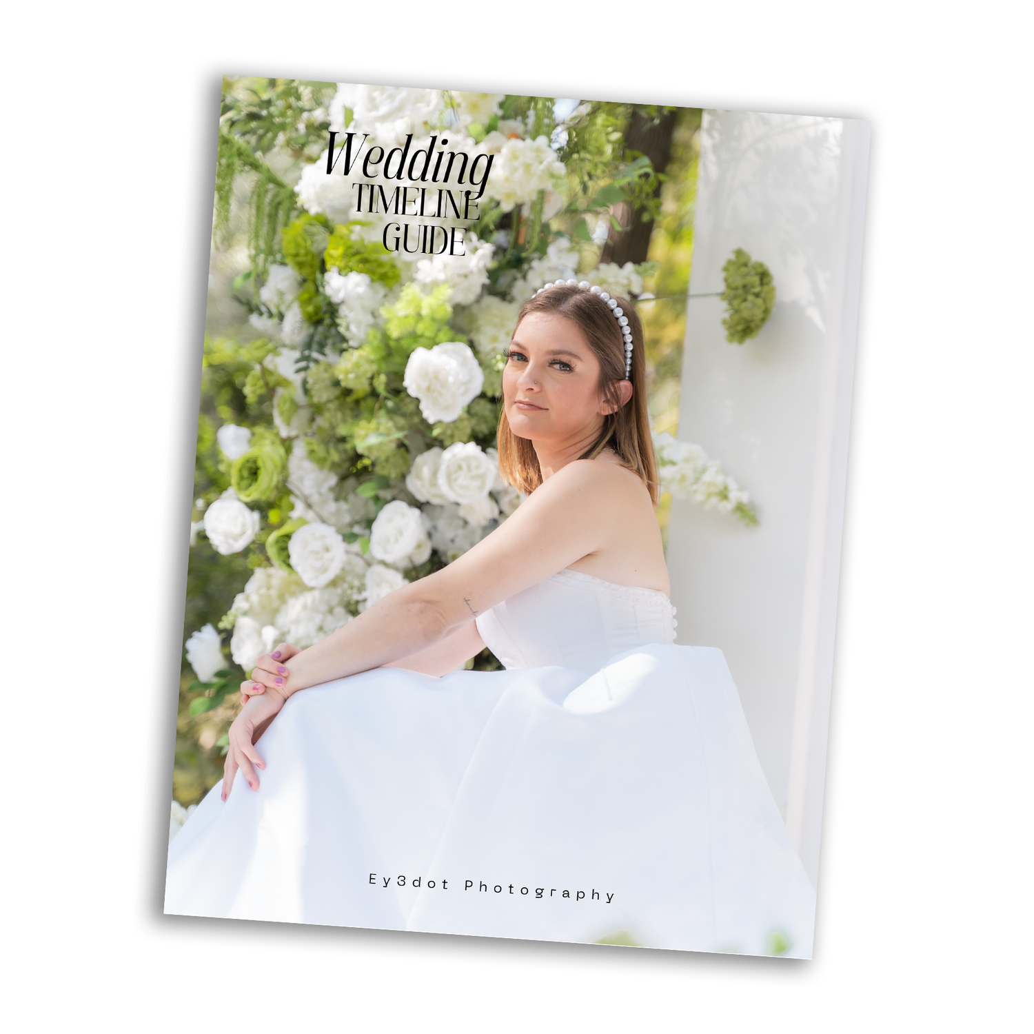 Wedding Timeline Guide booklet cover featuring a bride in a white gown posed against a lush green floral backdrop.