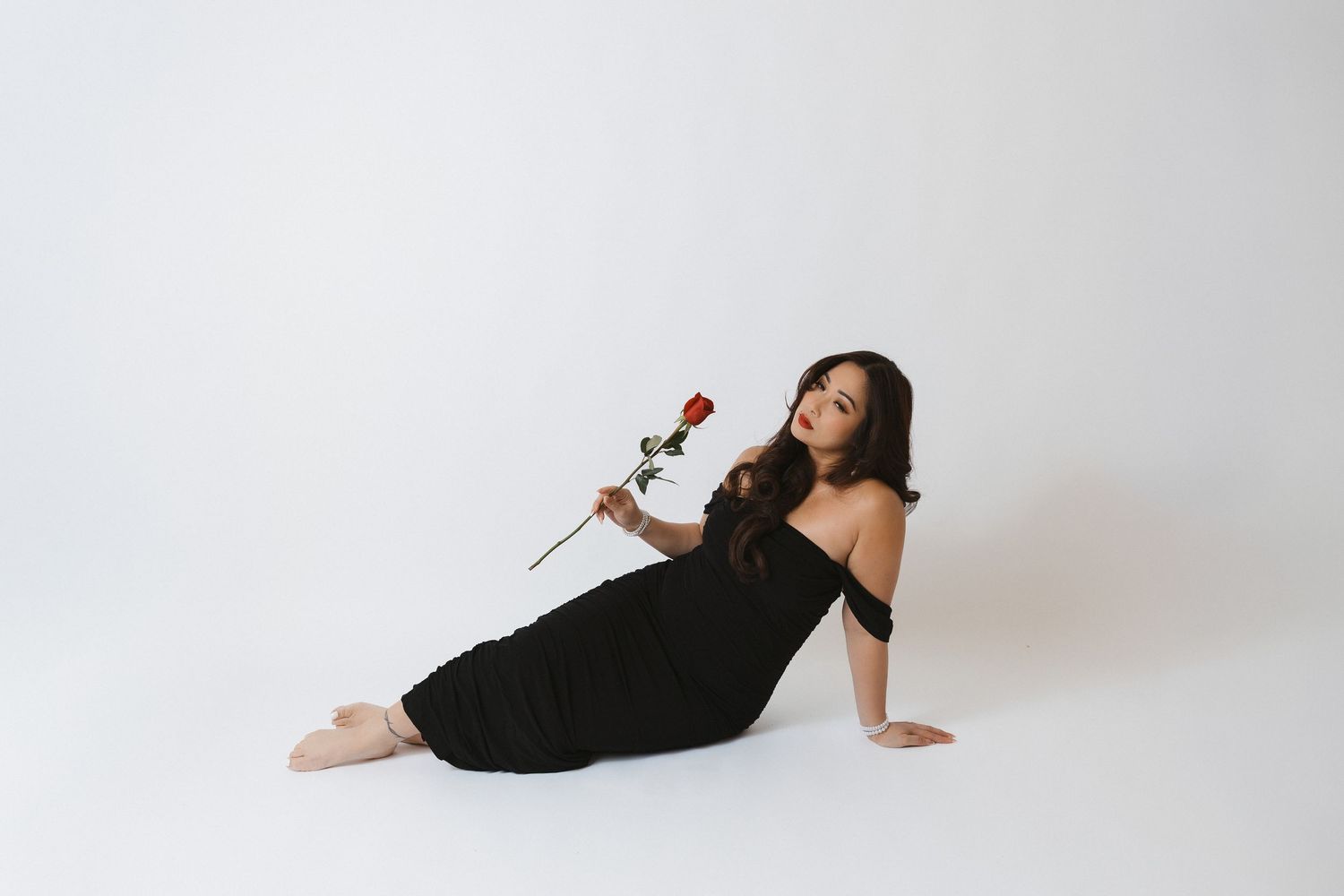 Minimalist portrait series showing graceful poses in white studio setting.