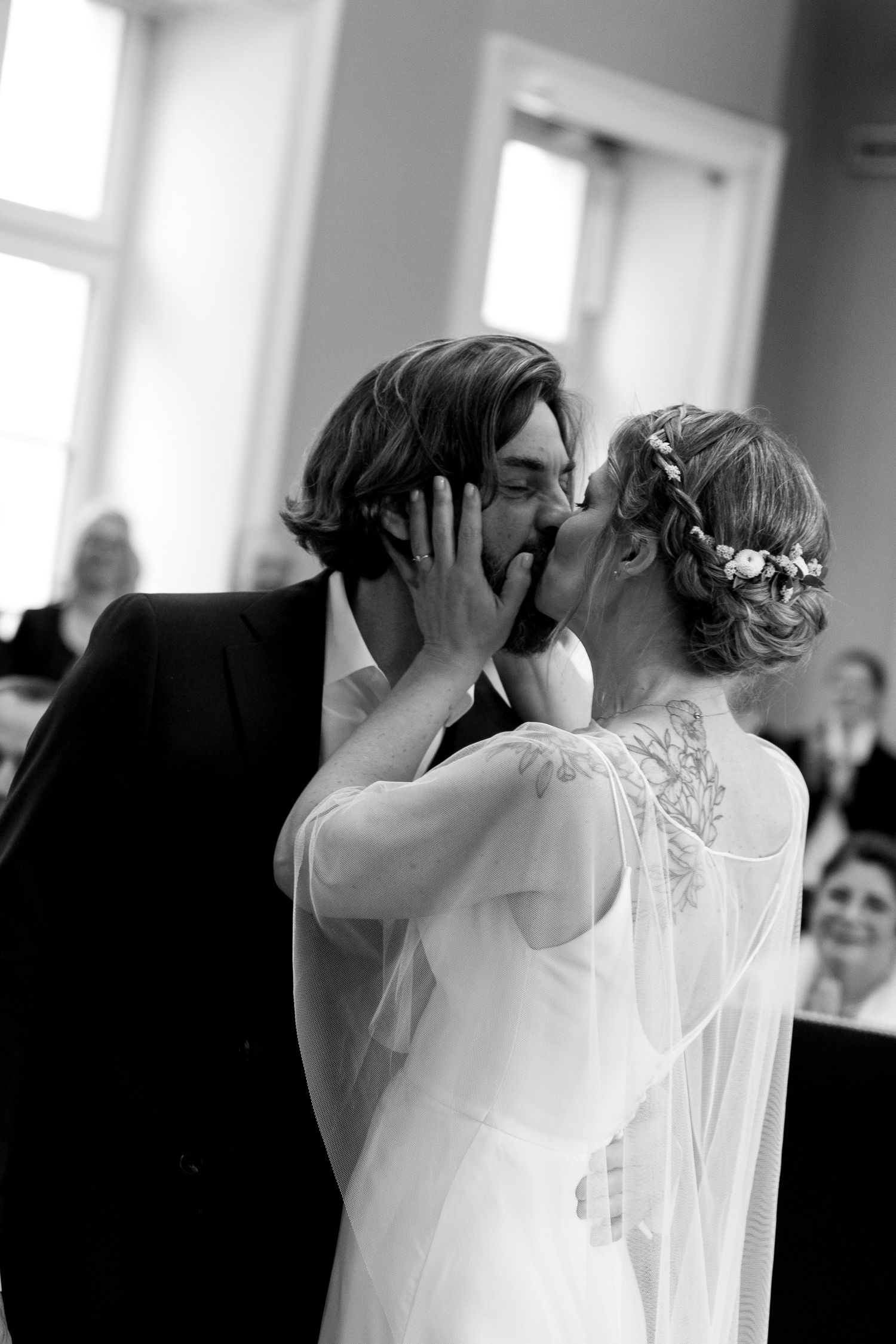 A romantic black and white wedding sequence showing an intimate first look moment.