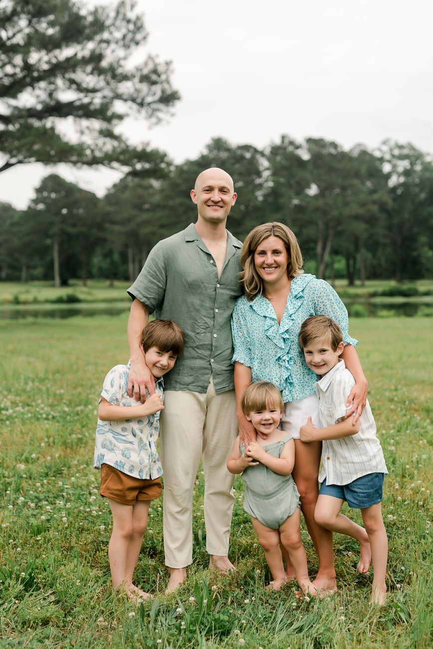 family standing together outdoors photography birmingham al