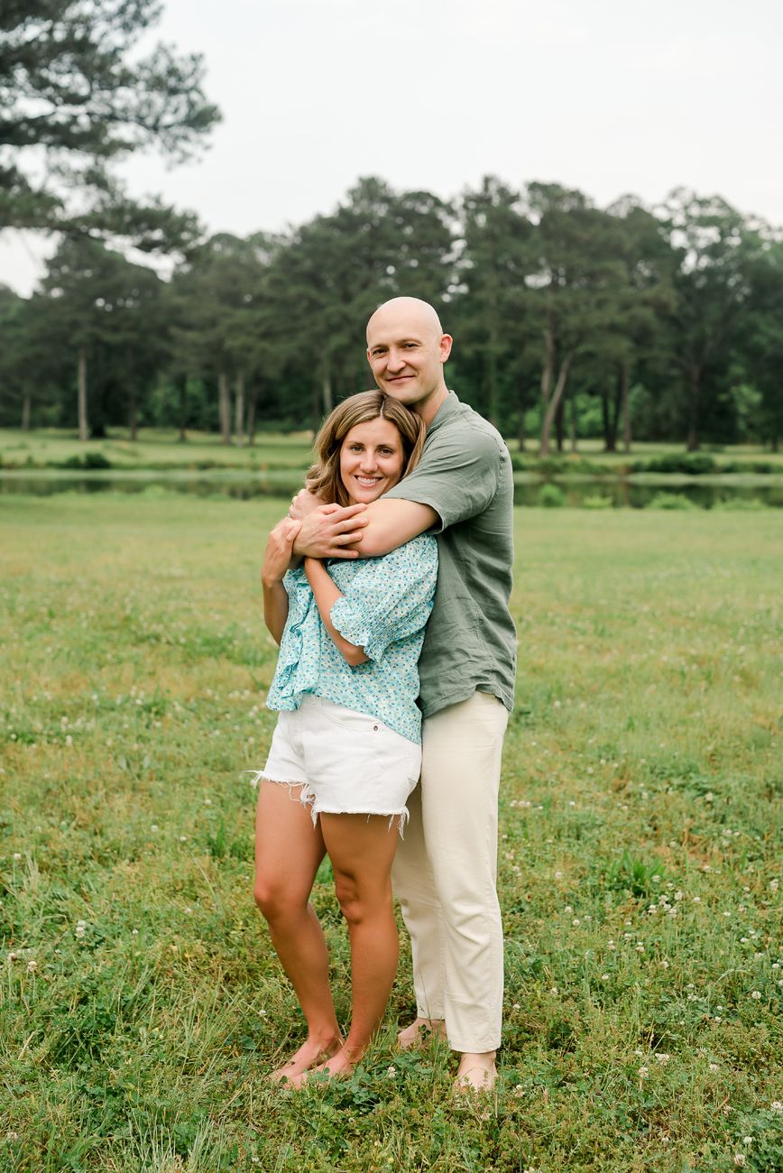 couple standing together cuddled in birmingham al