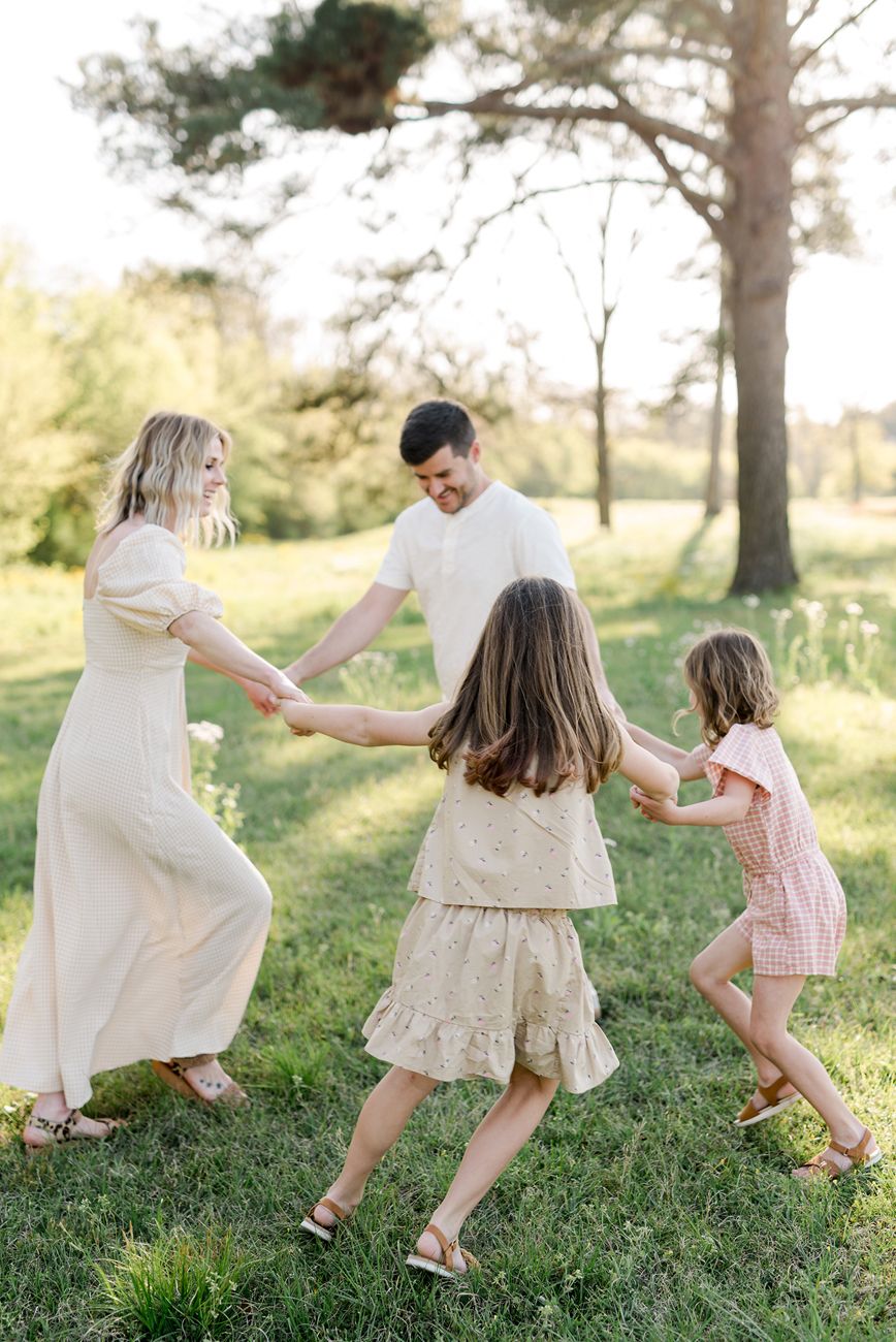 A series of joyful moments captured as people dance and twirl in a sunlit grassy field.