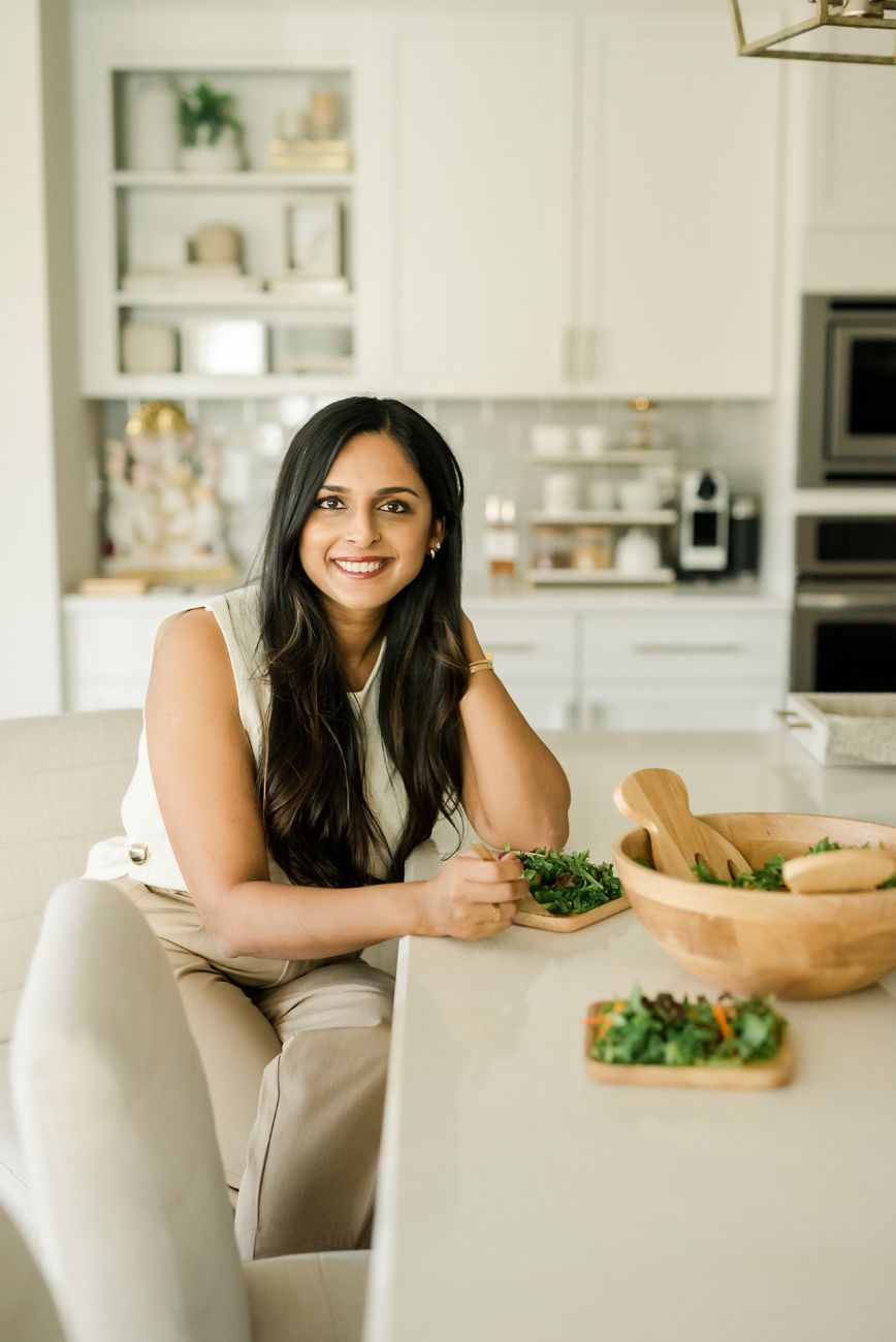 Series of lifestyle photos showing person preparing food in modern white kitchen.