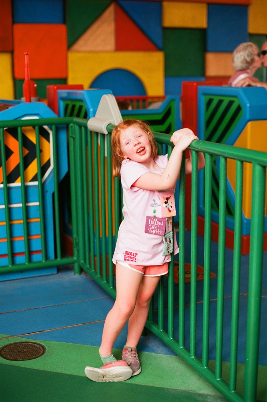 Colorful play area with geometric shapes and bright railings at Disney World.