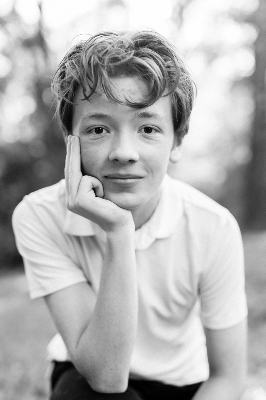 Black and white portrait sequence showing different expressions and poses.