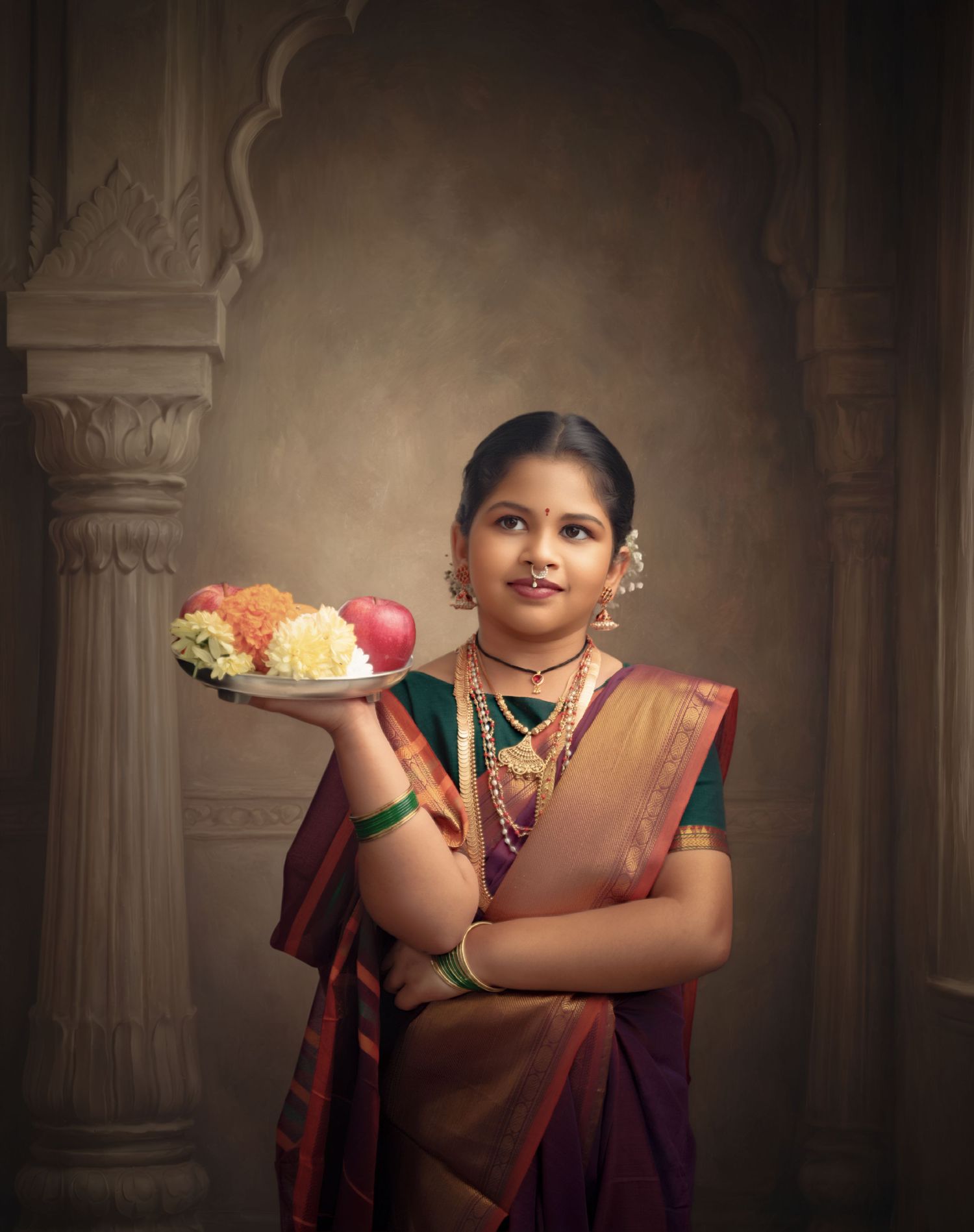 Traditional Indian portrait session with ornate jewelry and classical dance poses.