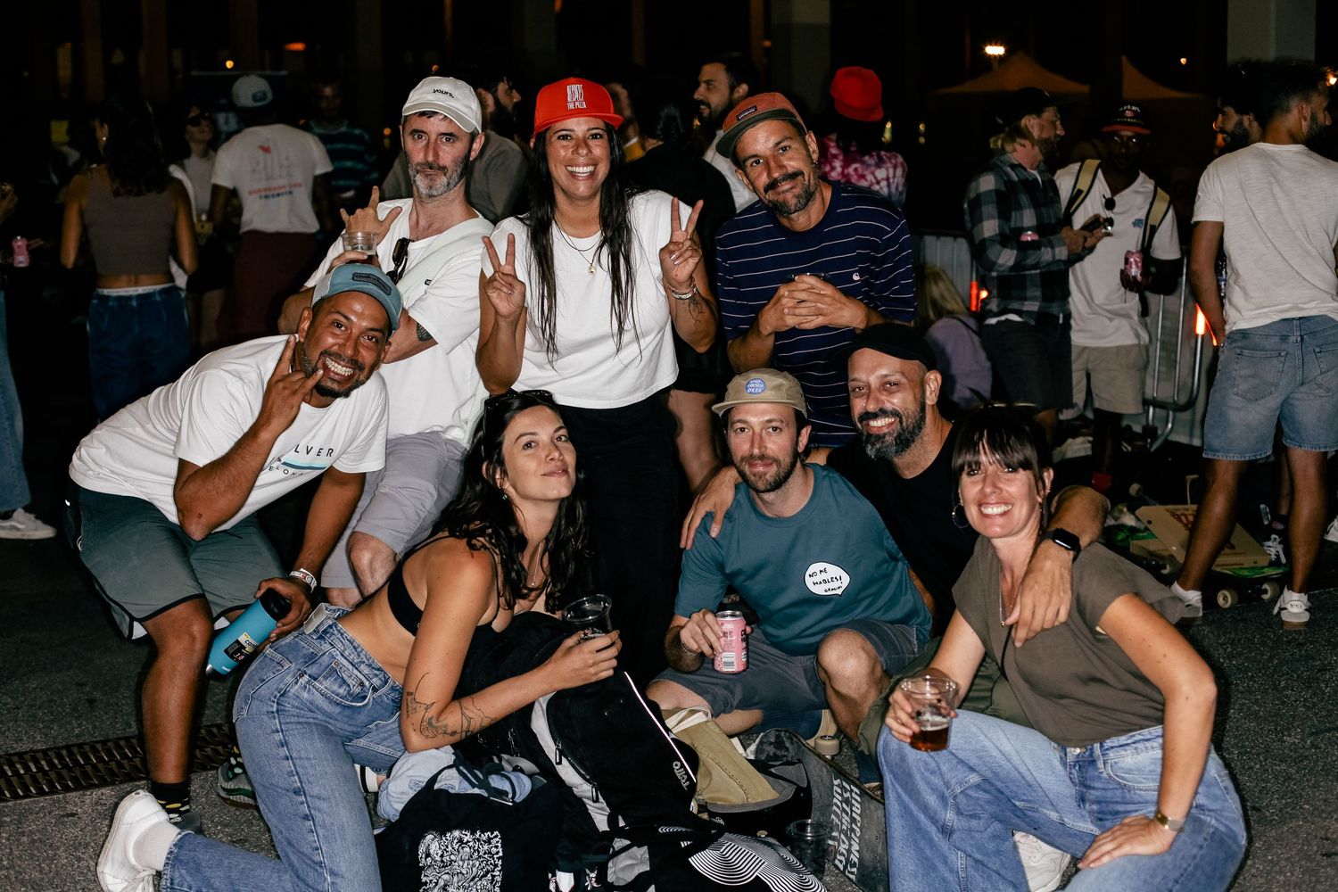 group of people posing happily during an event