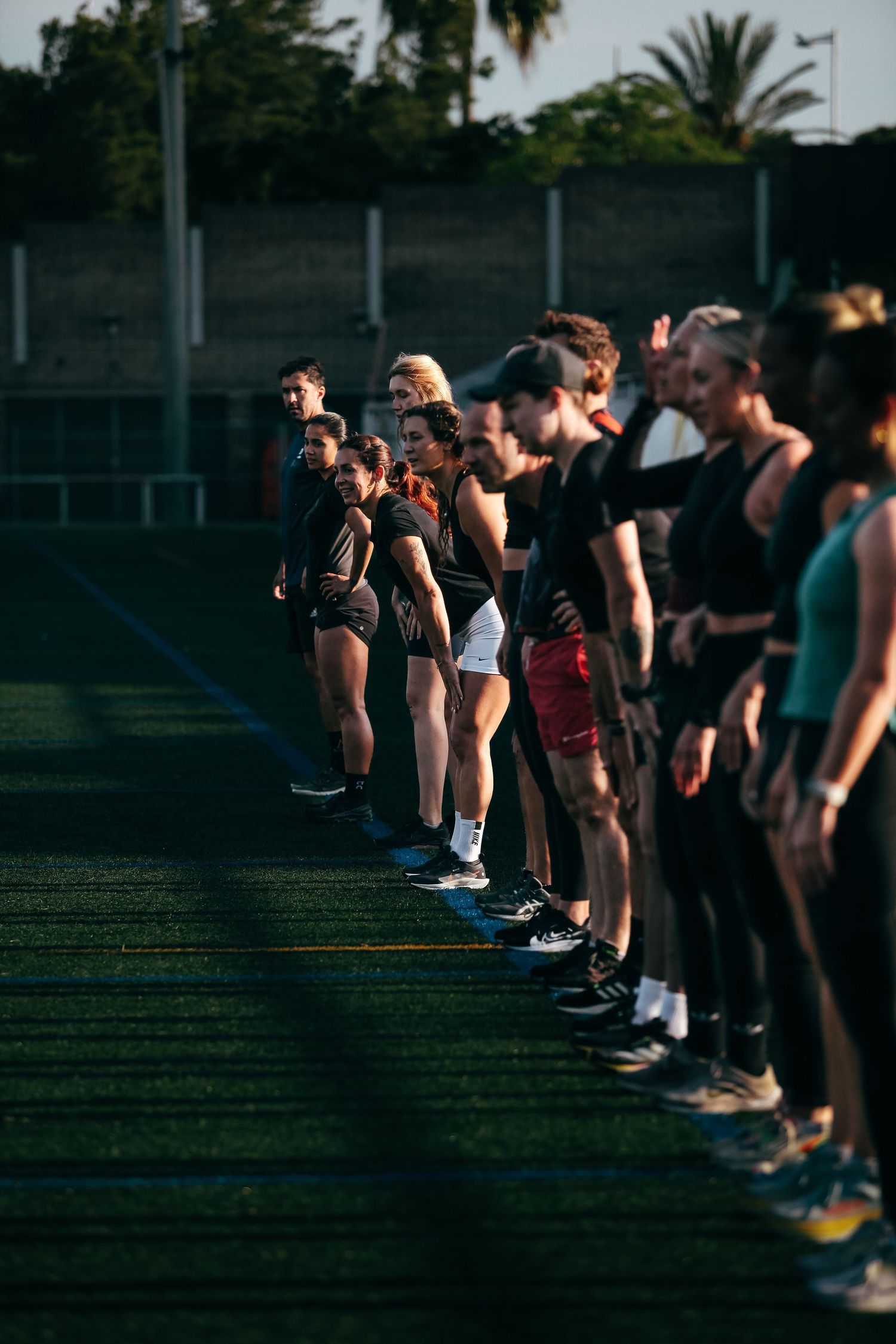 group of people lined up before running