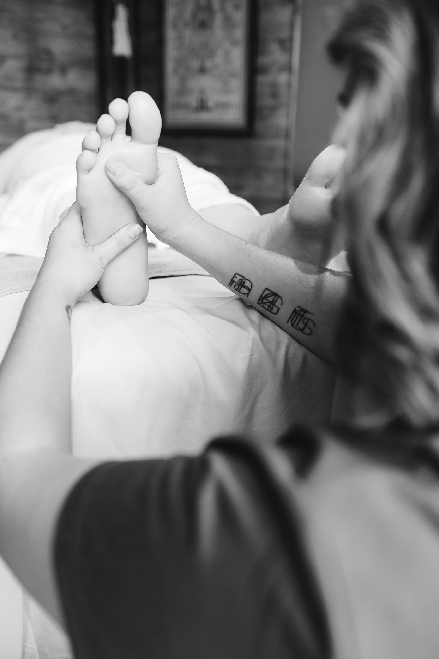 Personal brand photography Whitstable Kent. Massage Therapist with client.