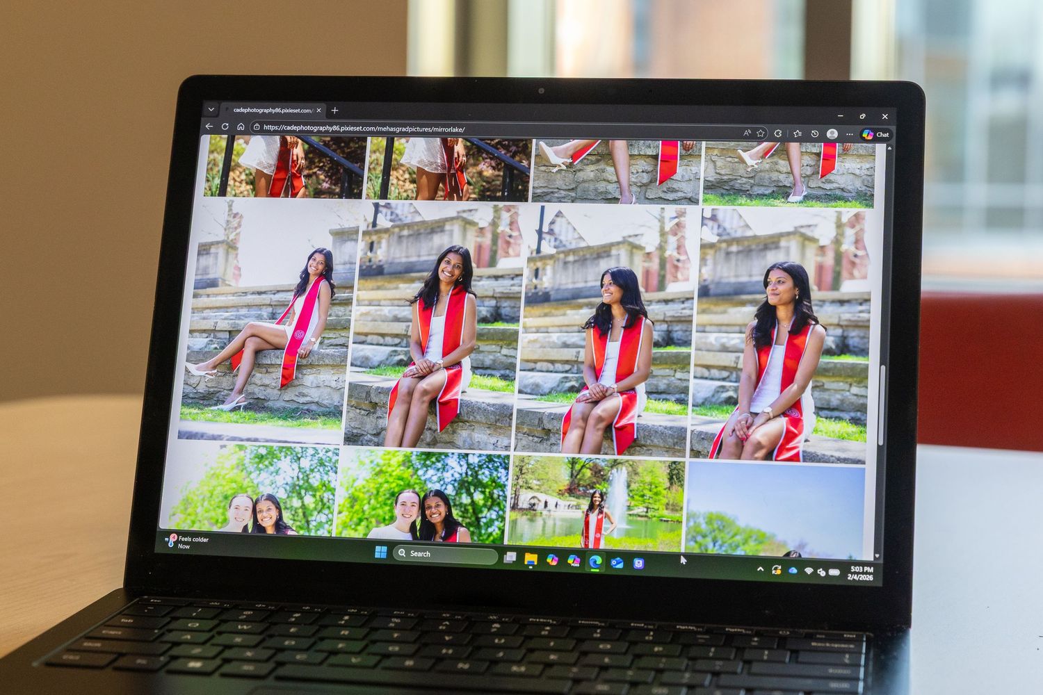A laptop screen displays a series of sequential sports action photos arranged horizontally.