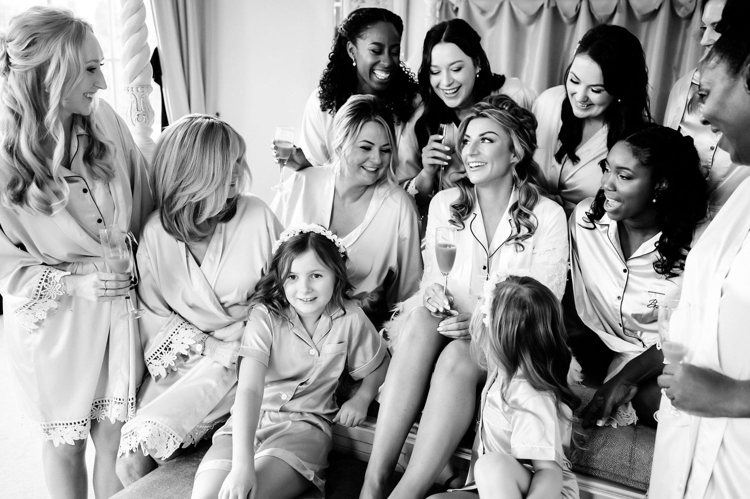 Black and white candid photos of bridal party getting ready before the ceremony.