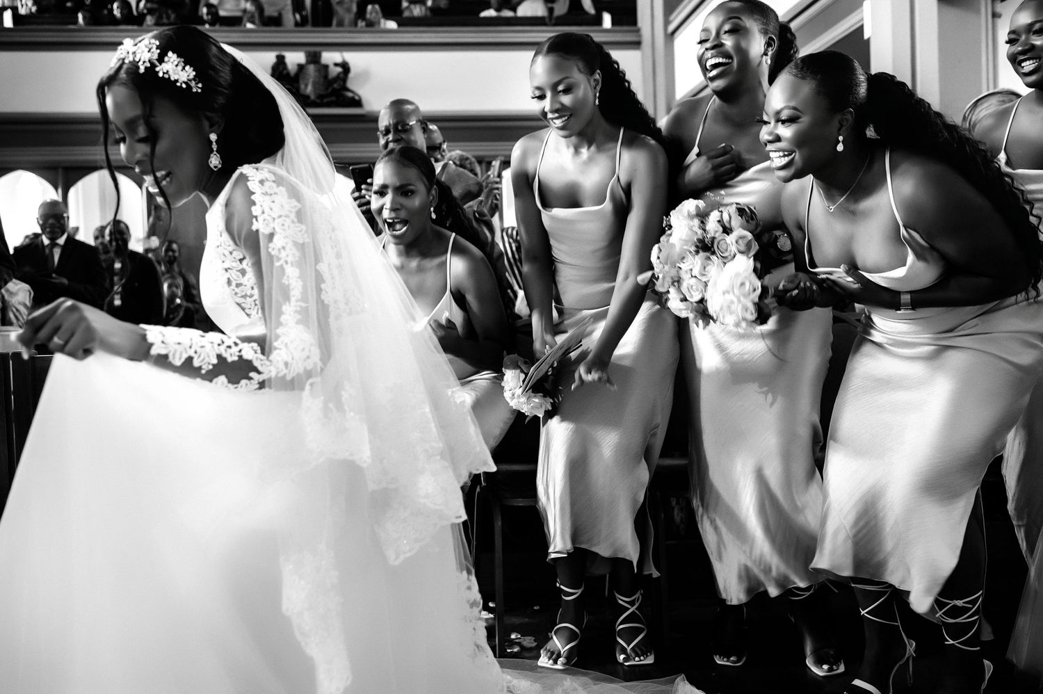 A black and white photo series showing wedding party moments with guests dancing and celebrating together.