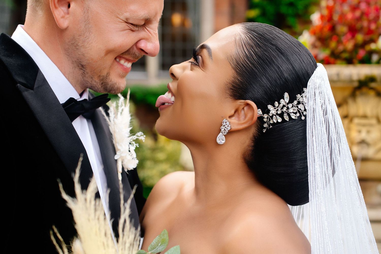 Intimate wedding portrait showing joyful laughter and connection between the couple.