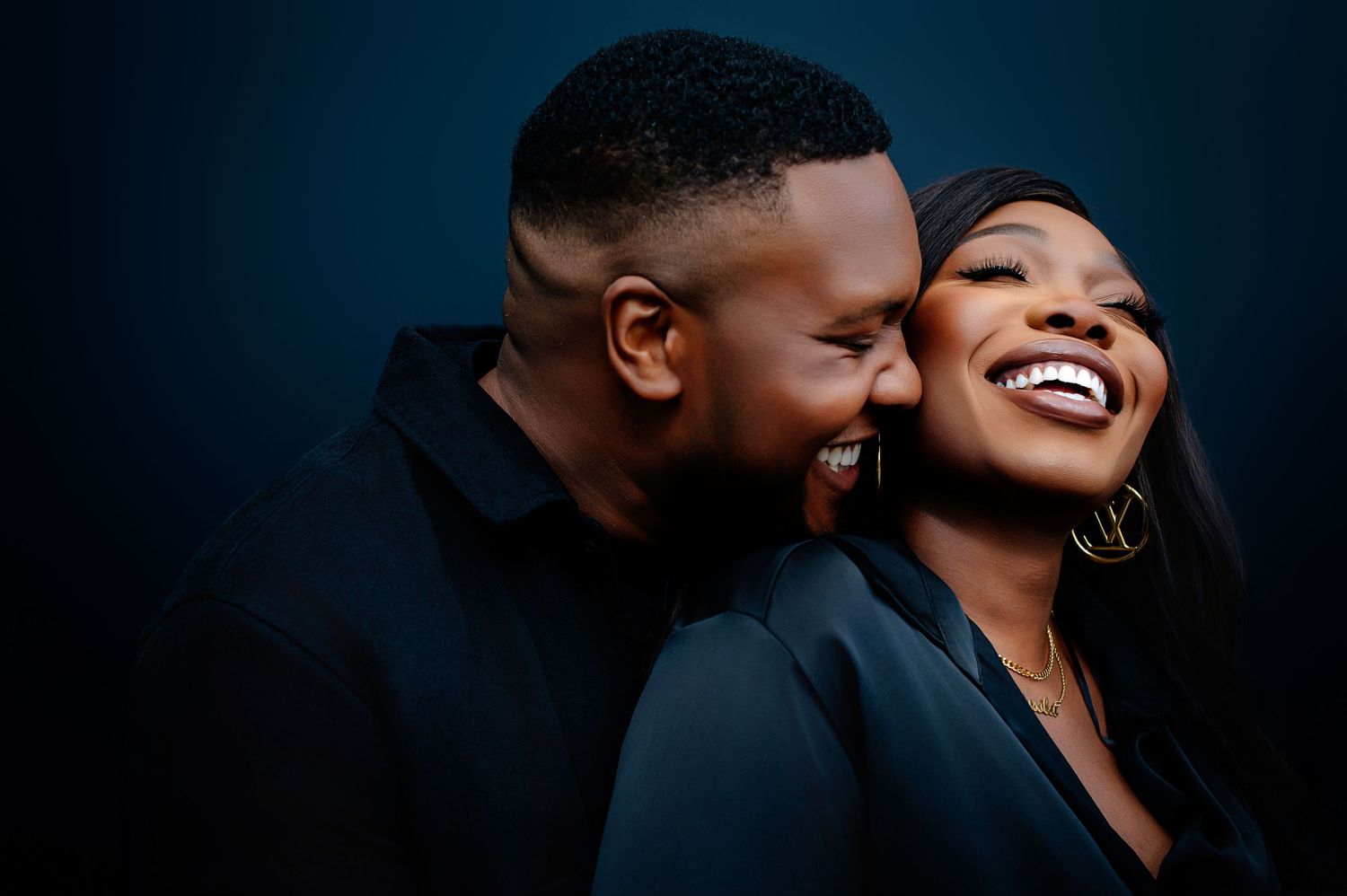 Romantic couple portrait series with dark background showing intimate moments.