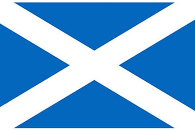 Flag of Scotland featuring a white diagonal cross of Saint Andrew on a bright blue background.