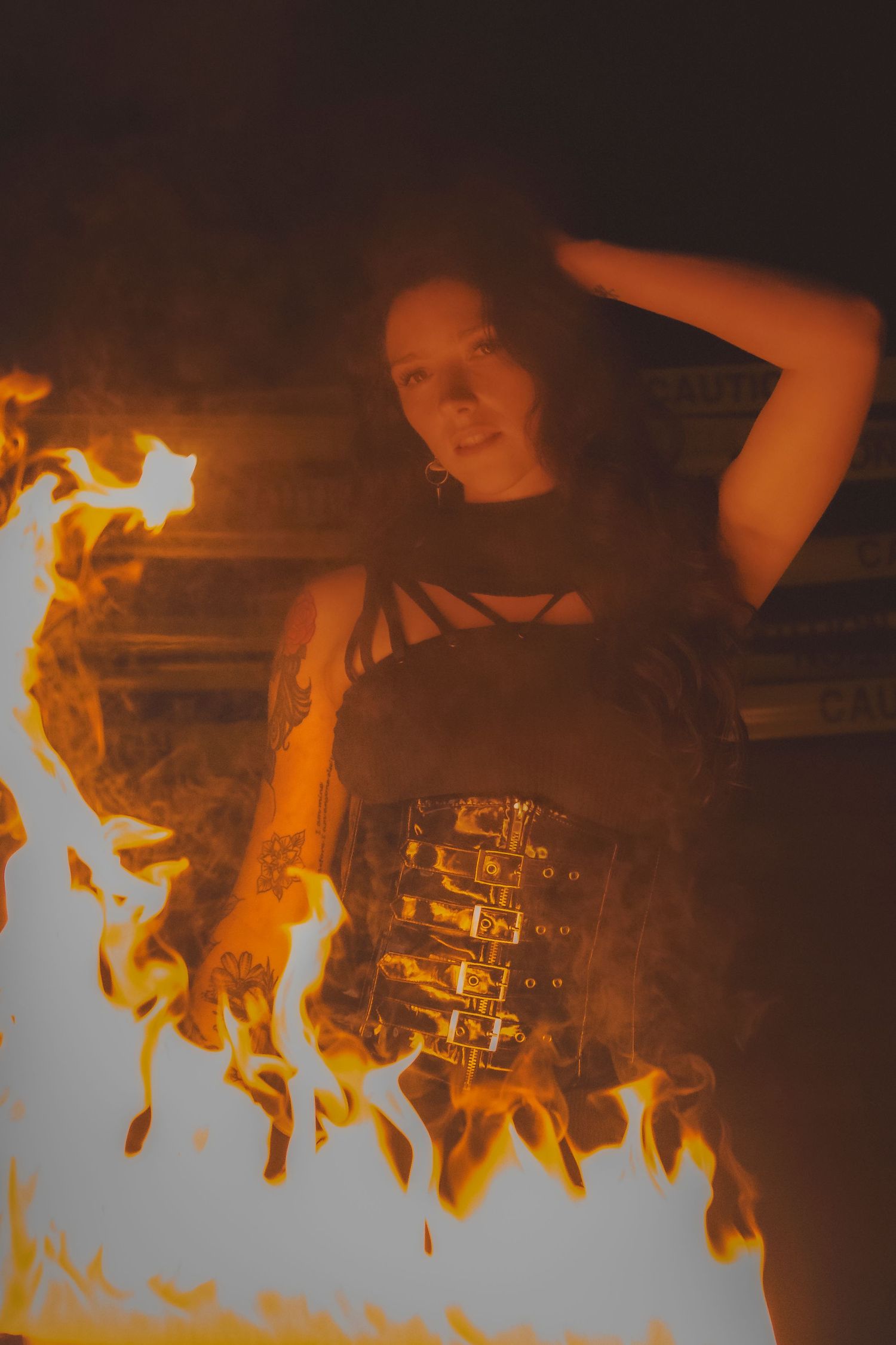 Timelapse sequence showing fire spreading across a dark surface in five progressive stages with orange flames.