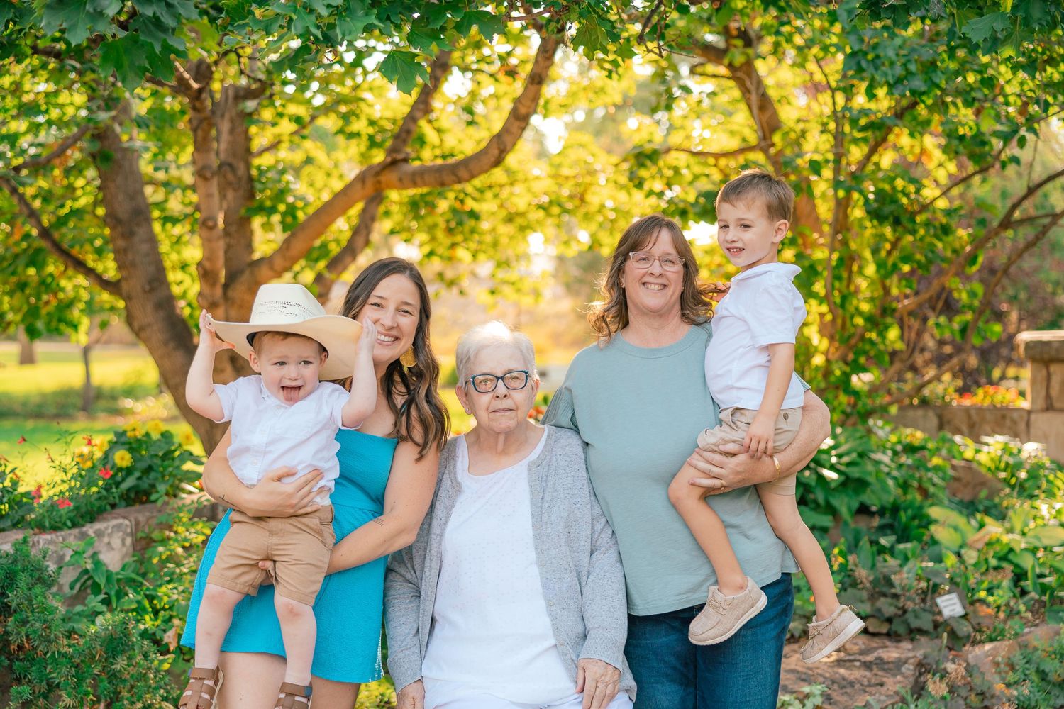 photograph of family in a foliage environment
