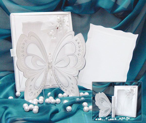 Elegant white butterfly-themed wedding invitation set with pearls on turquoise silk.