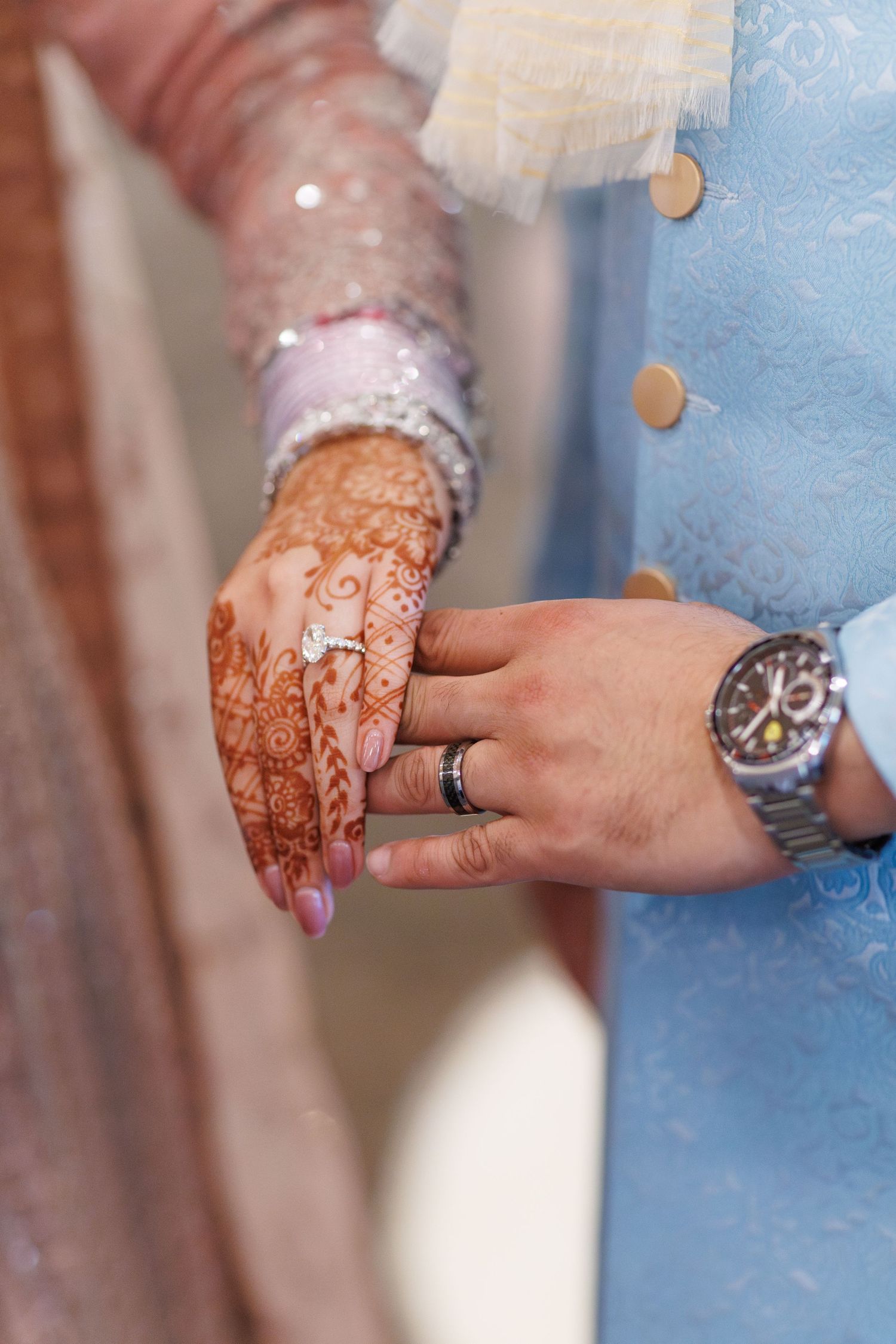 couple showing off their new wedding rings in avon indiana at washington township Pavilion