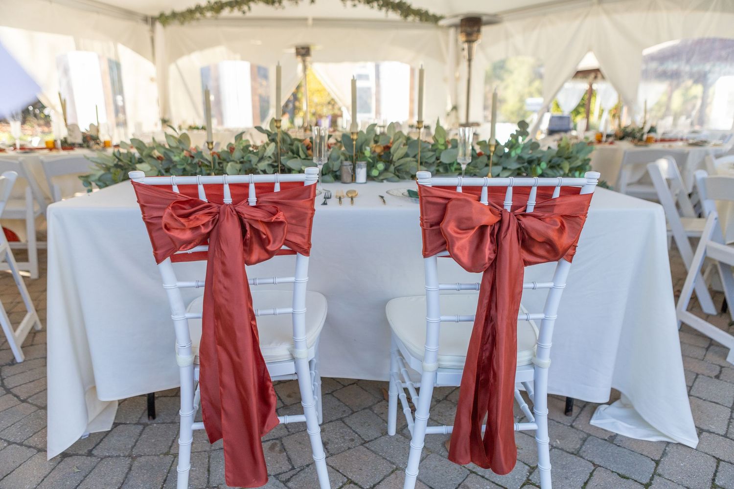 all white tent setup for cocktail hour during a wedding in avon indiana at the avon gardens