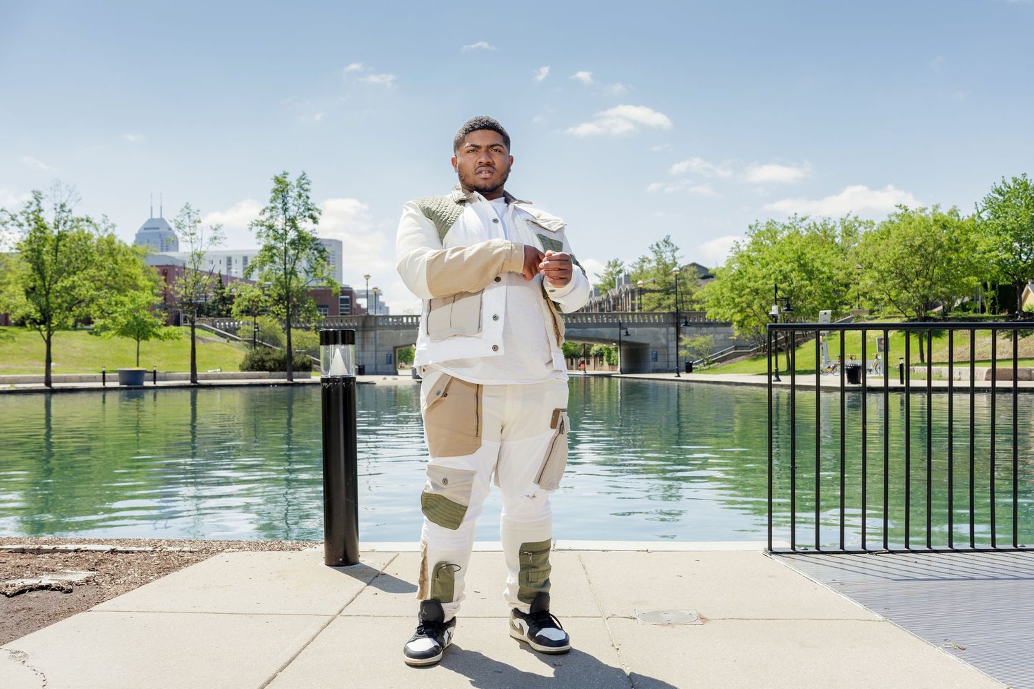 vibrant portrait for a model standing downtown indianapolis canal
