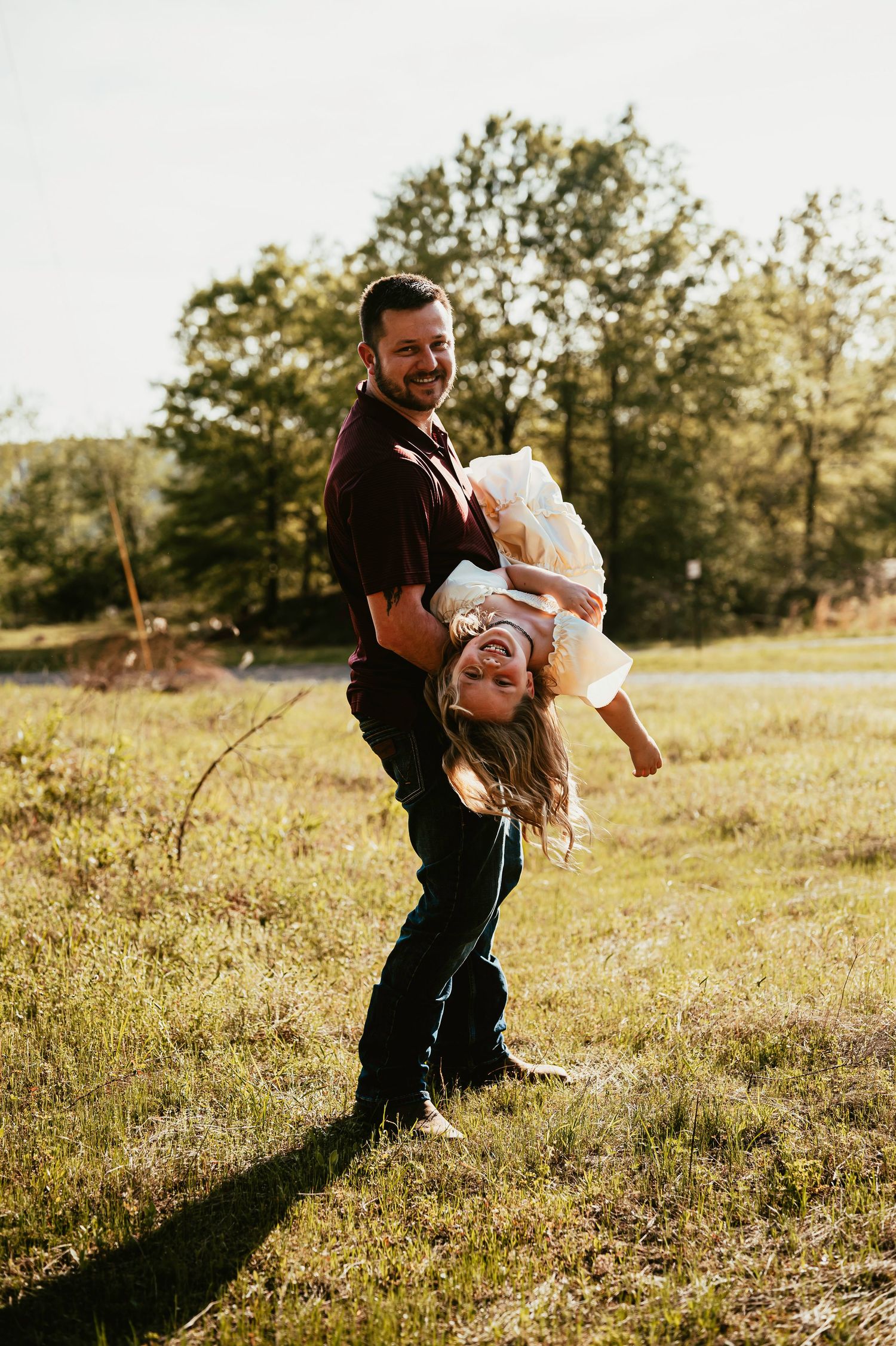 a dad being silly with his daughter