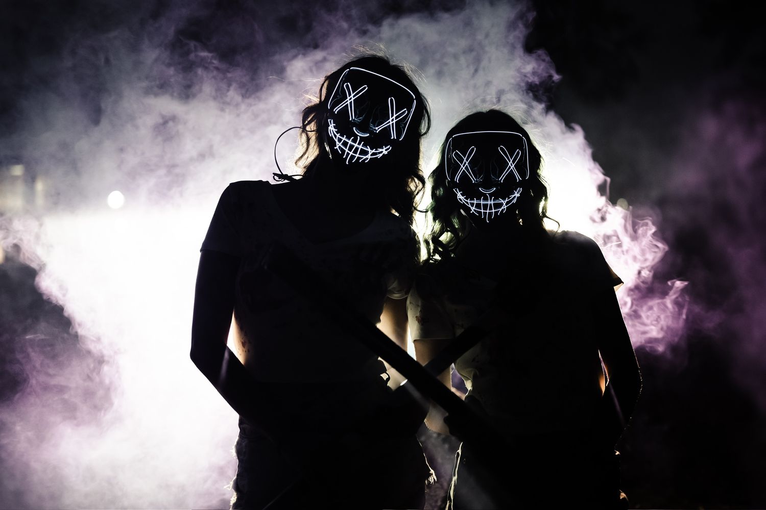 Dark atmospheric sequence with glowing masks and purple smoke effects.