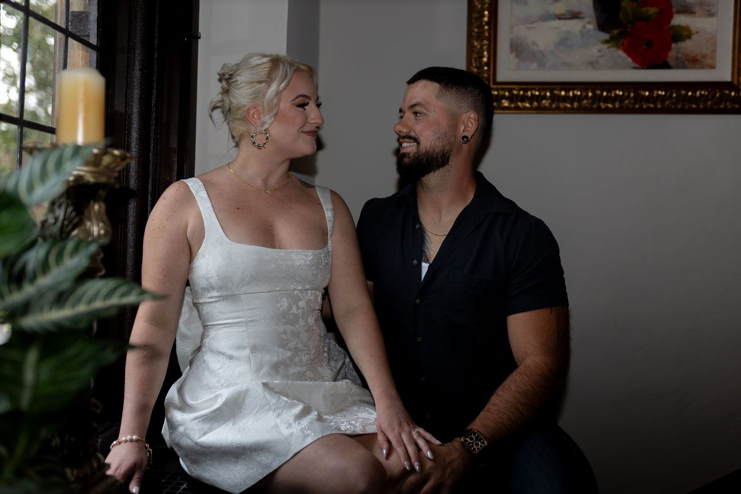 Intimate and cozy engagement session moment with a warm, moody aesthetic inside Stokesay Castle.