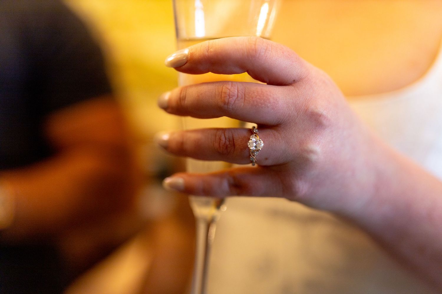 Intimate and cozy engagement session moment with a warm, moody aesthetic inside Stokesay Castle.