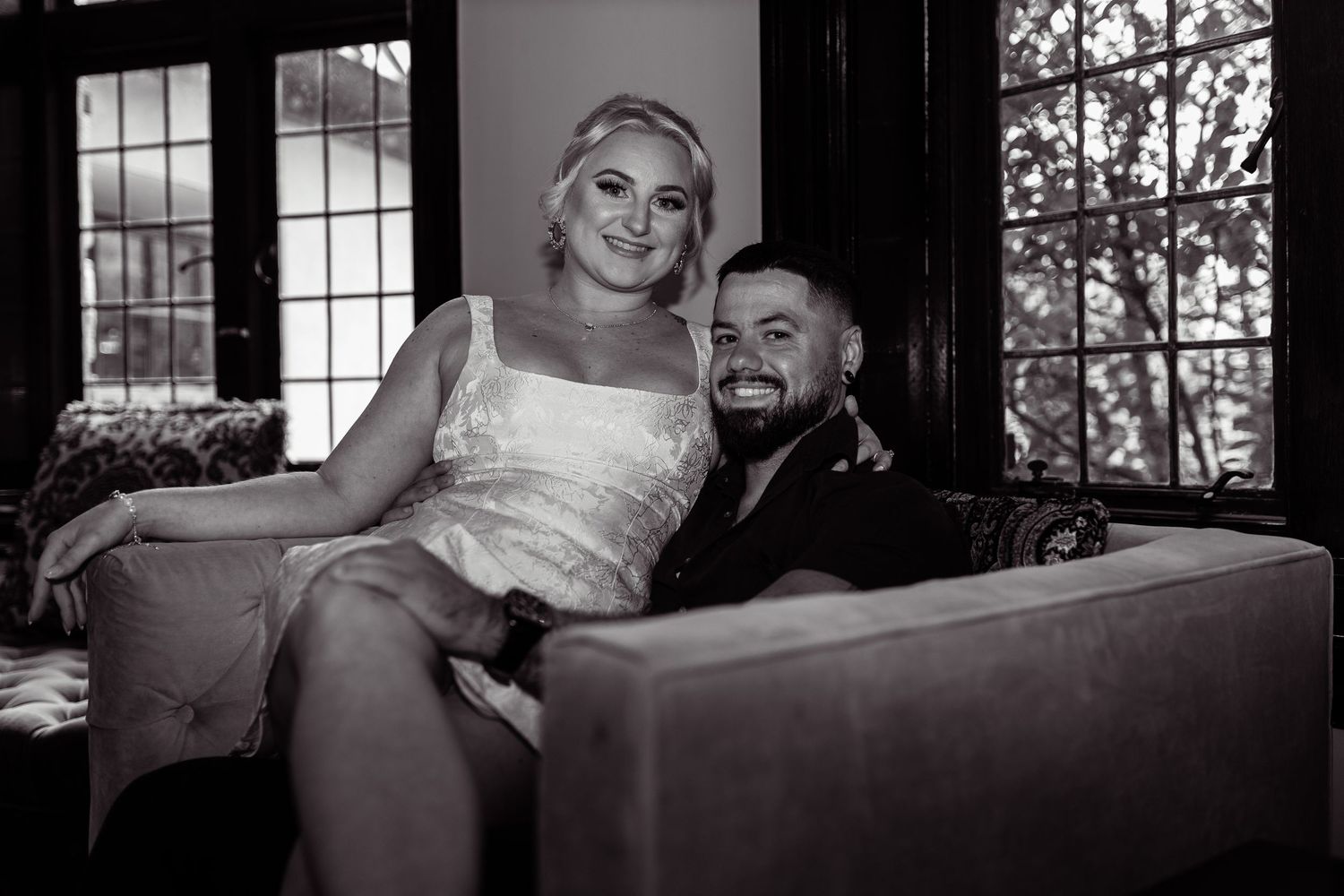 Intimate and cozy engagement session moment with a warm, moody aesthetic inside Stokesay Castle.