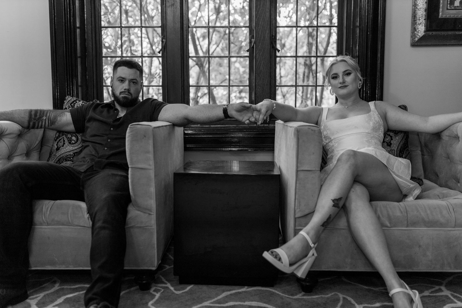 Intimate and cozy engagement session moment with a warm, moody aesthetic inside Stokesay Castle.