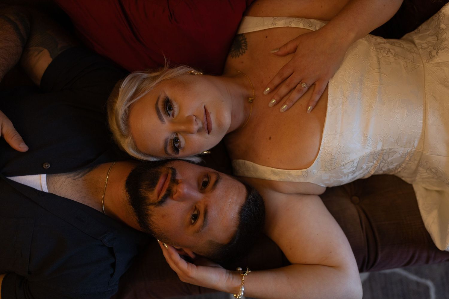 Intimate and cozy engagement session moment with a warm, moody aesthetic inside Stokesay Castle.