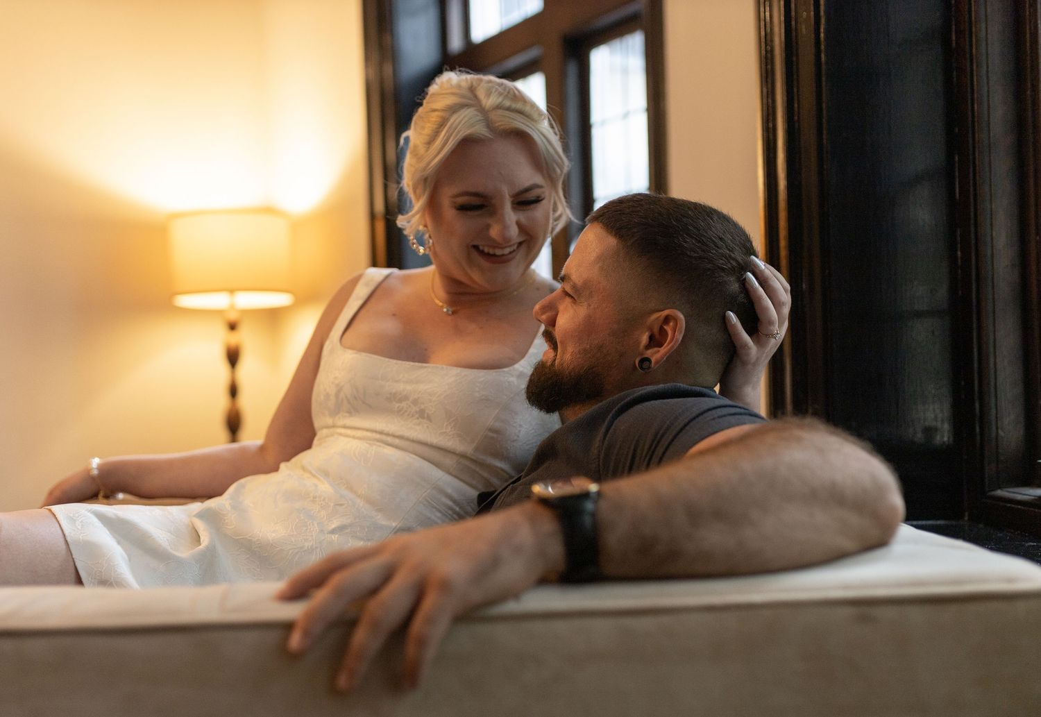 Intimate and cozy engagement session moment with a warm, moody aesthetic inside Stokesay Castle.