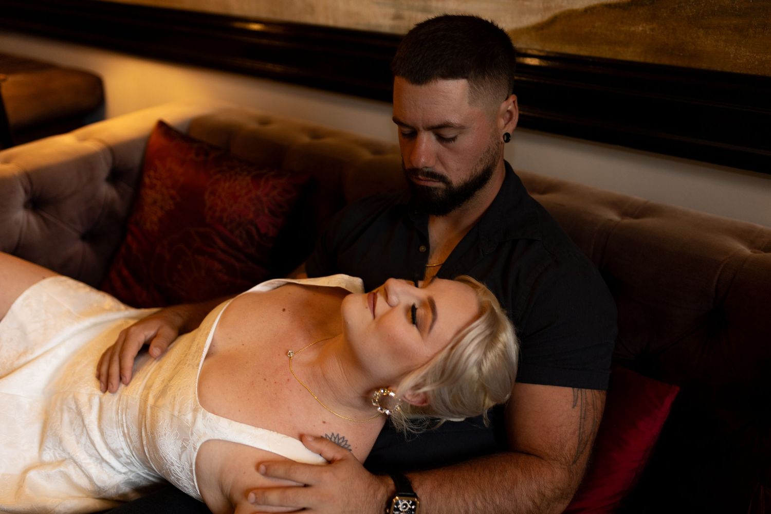 Intimate and cozy engagement session moment with a warm, moody aesthetic inside Stokesay Castle.