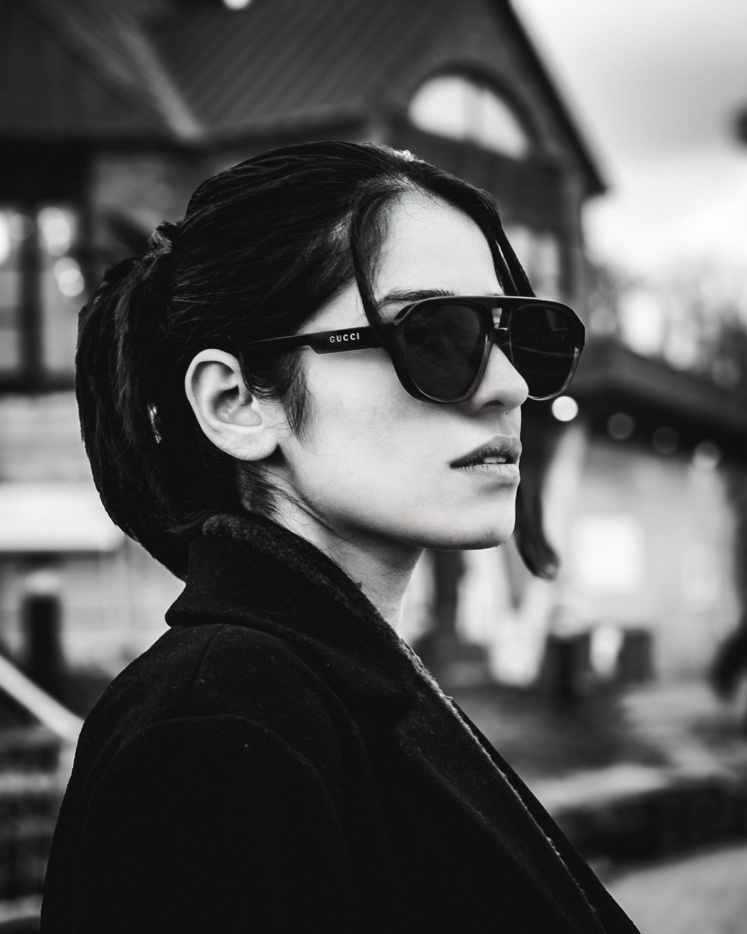 Black and white portrait series with sunglasses in film noir style.