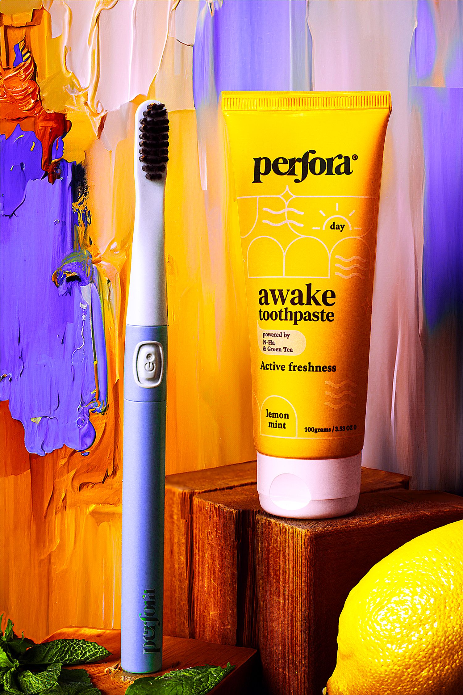 Colorful beauty and skincare products arranged on wooden shelf with pink and purple lighting effects and a fresh lemon.