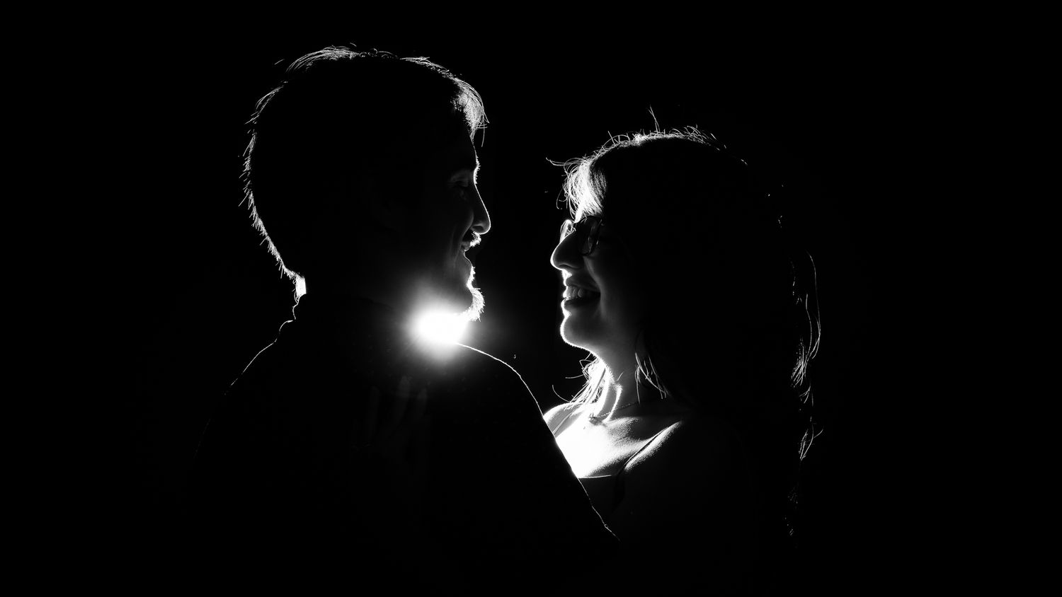 A dramatic silhouette sequence shows a person's profile against dark backgrounds with rim lighting effects.