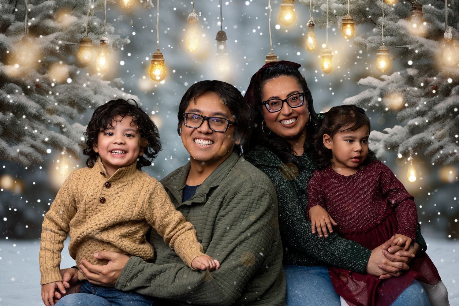 A group poses for holiday photos with twinkling lights and a snowy background creating a festive winter atmosphere.
