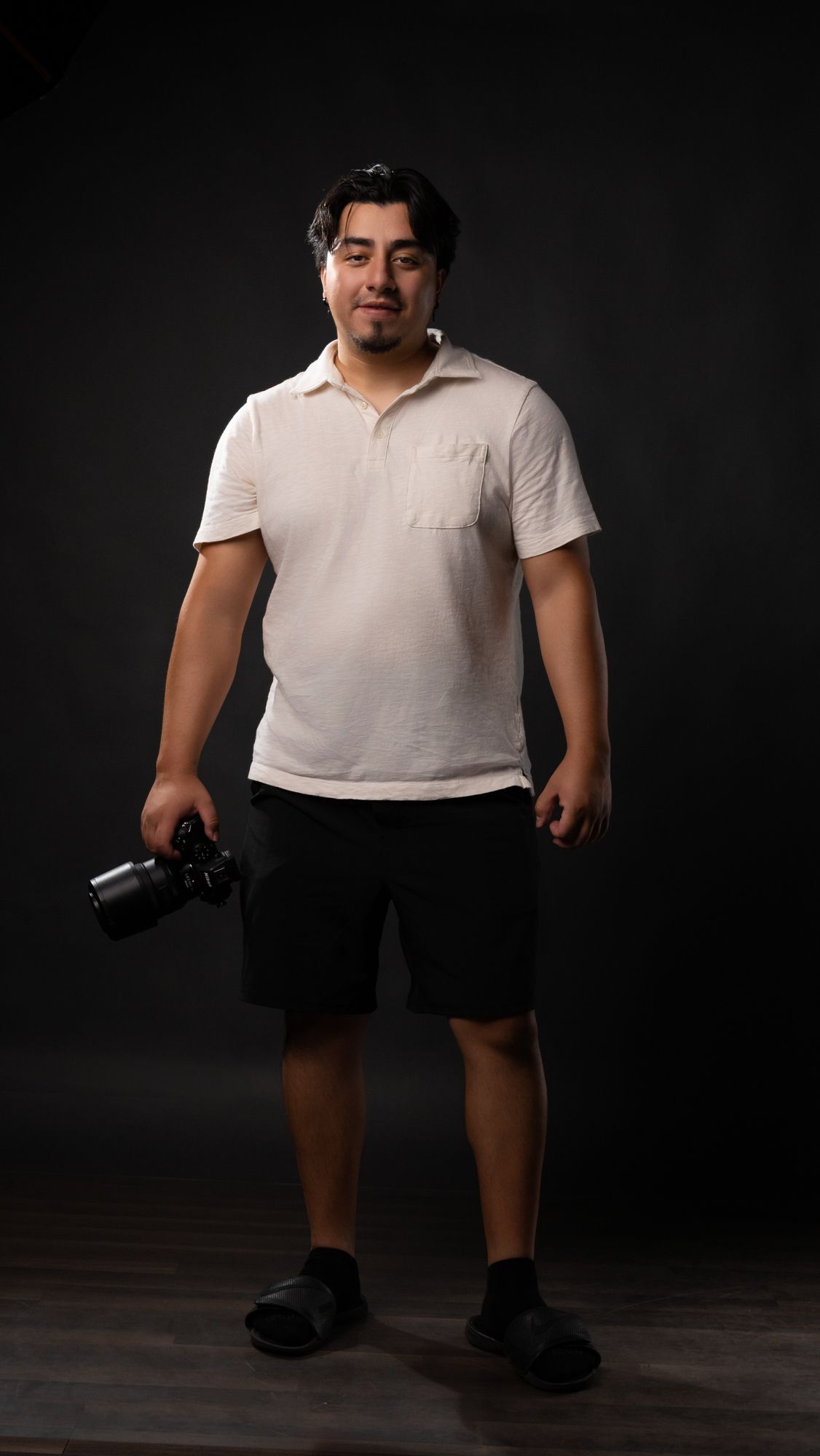 Tony Rivas photographer with a Nikon camera