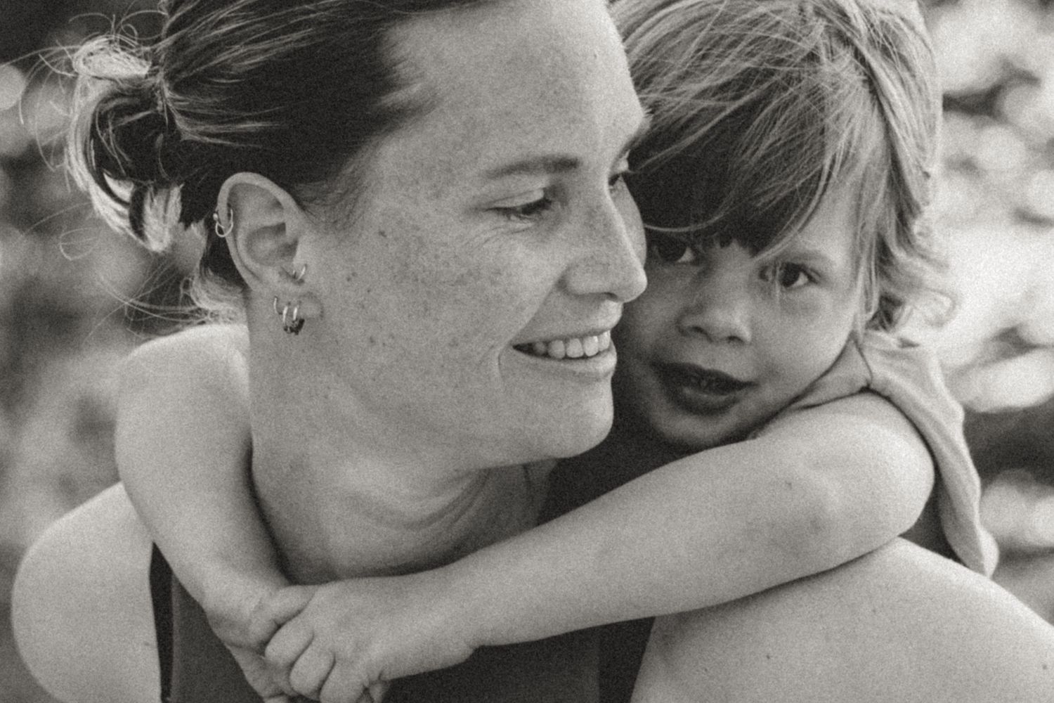 Candid black and white photos showing tender family moments.