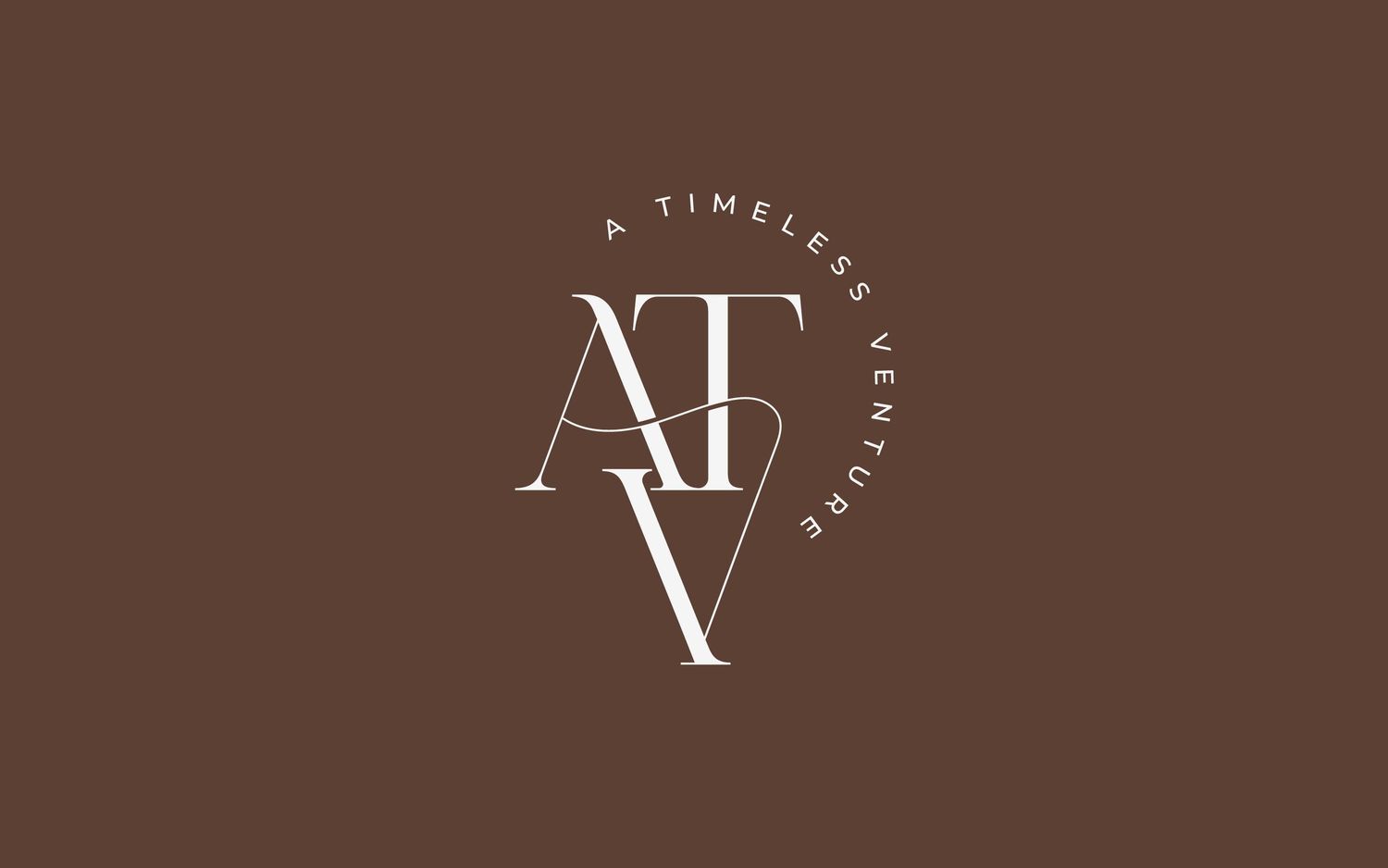 Elegant monogram logo for A Timeless Venture featuring intertwined ATV letters on a warm brown background.
