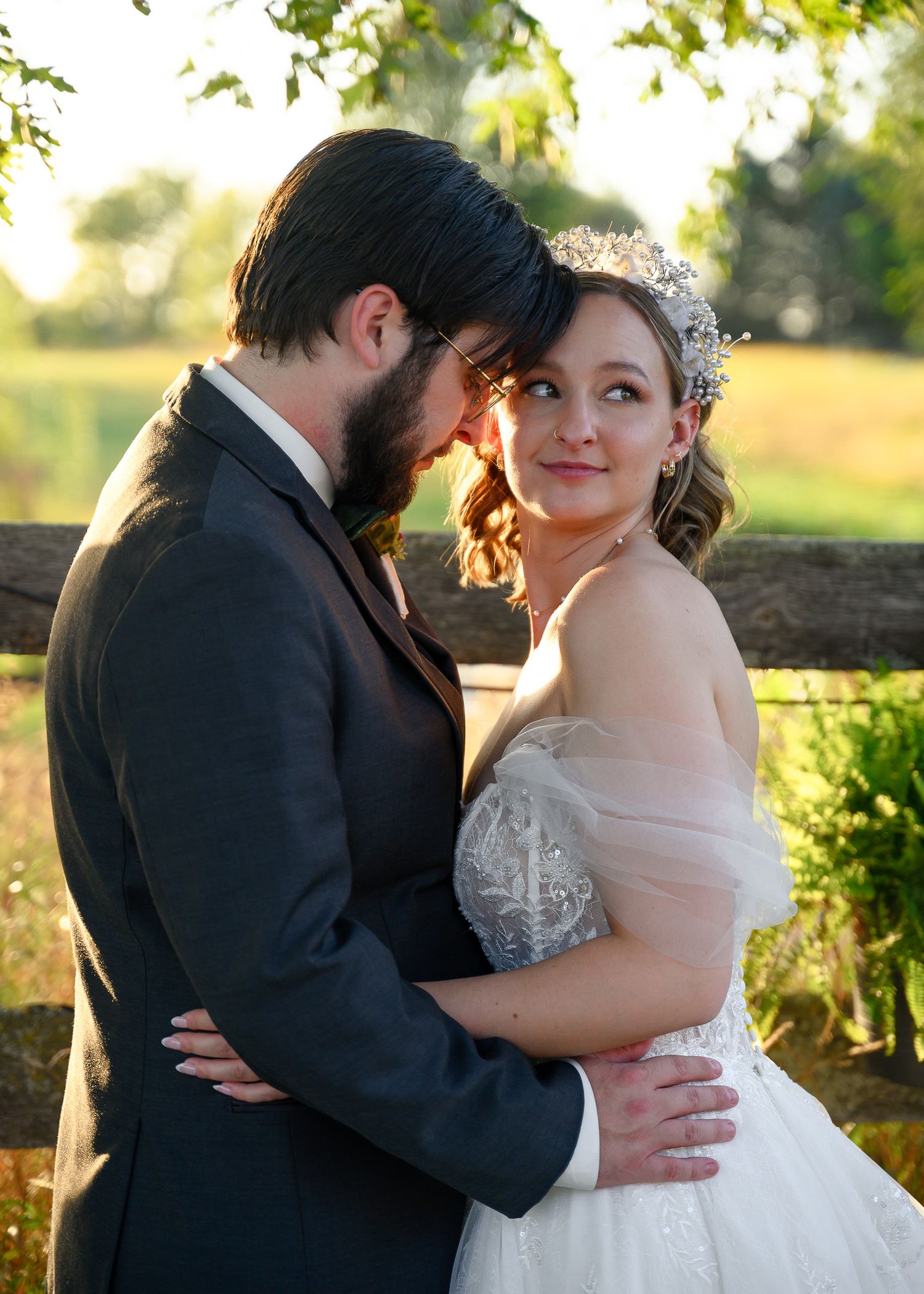 Romantic wedding photo sequence showing tender moments between newlyweds at sunset in an outdoor garden setting.