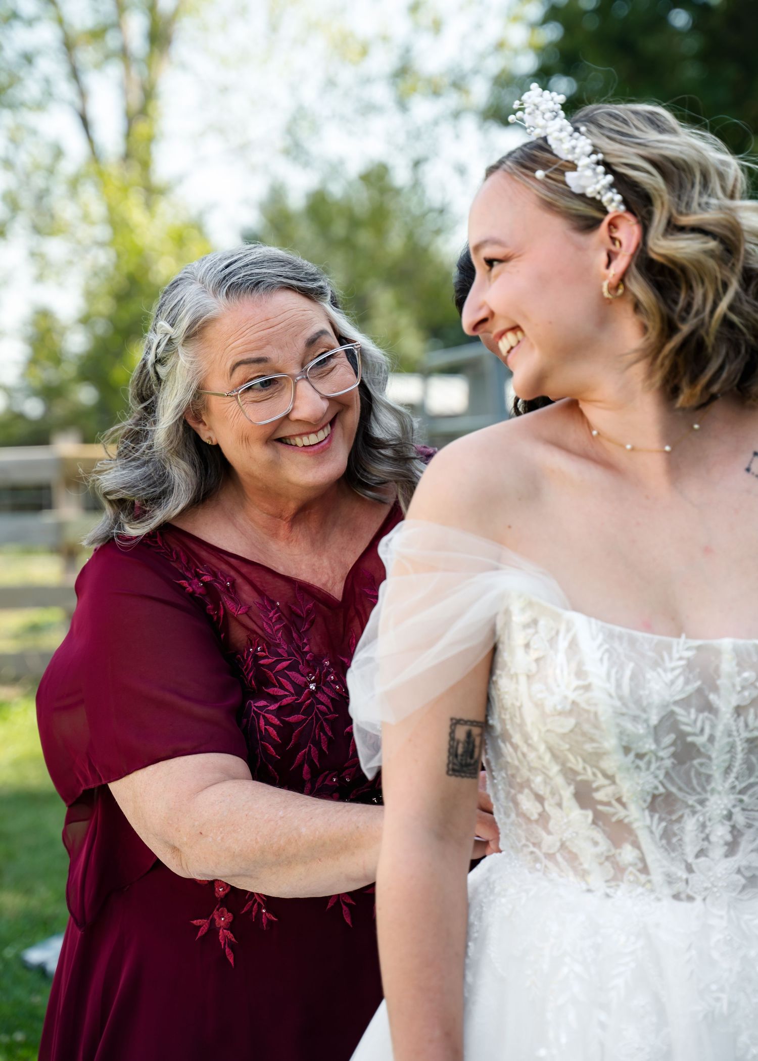 Emotional wedding moments captured in a series of candid photos showing tender embraces and joyful smiles.