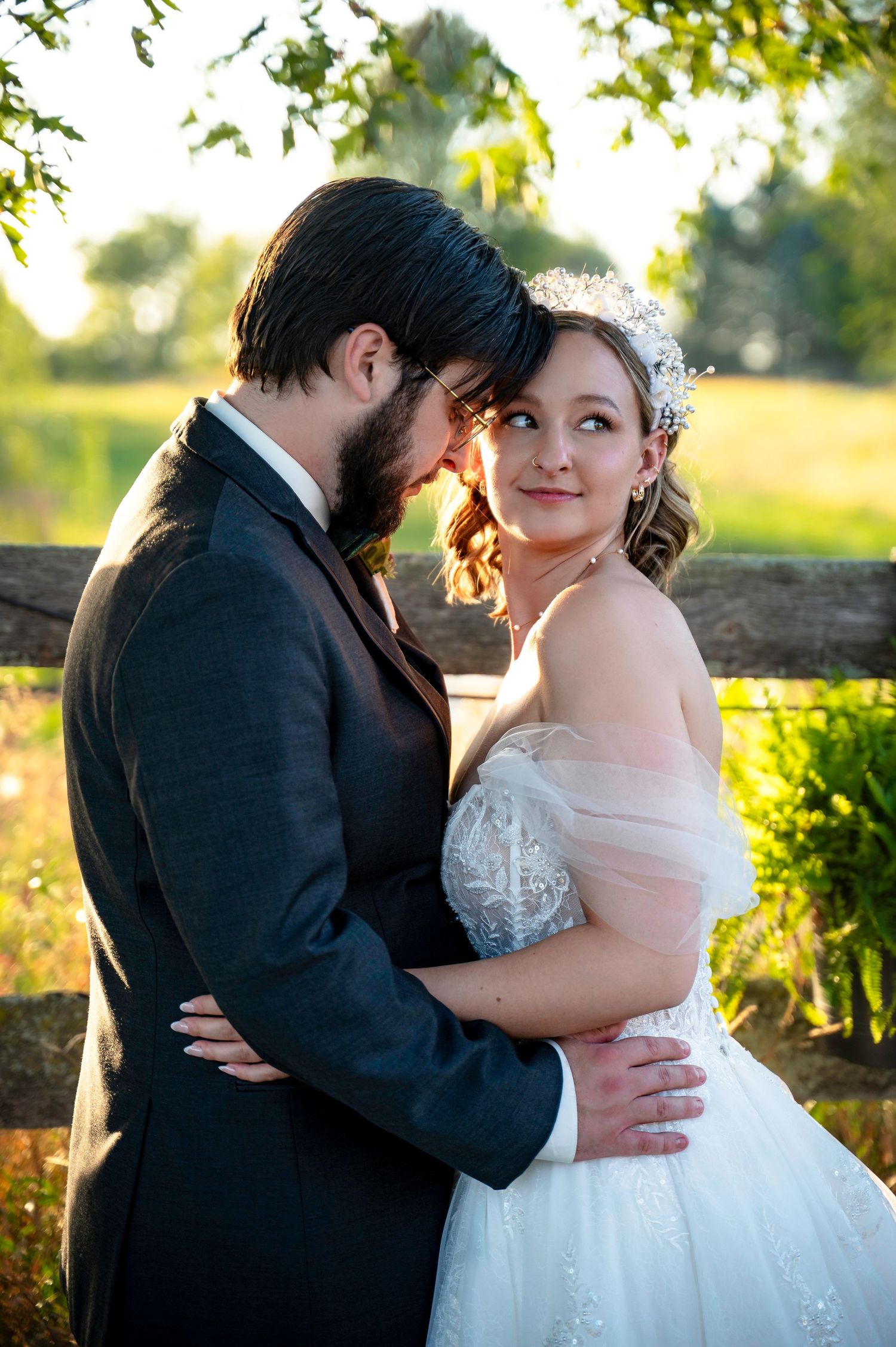 A romantic wedding couple shares intimate moments in a series of sunset portraits against a natural outdoor backdrop.