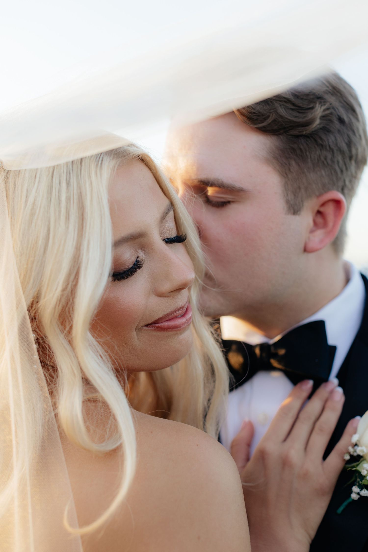 Intimate close-up wedding portraits showing gentle expressions and emotions.