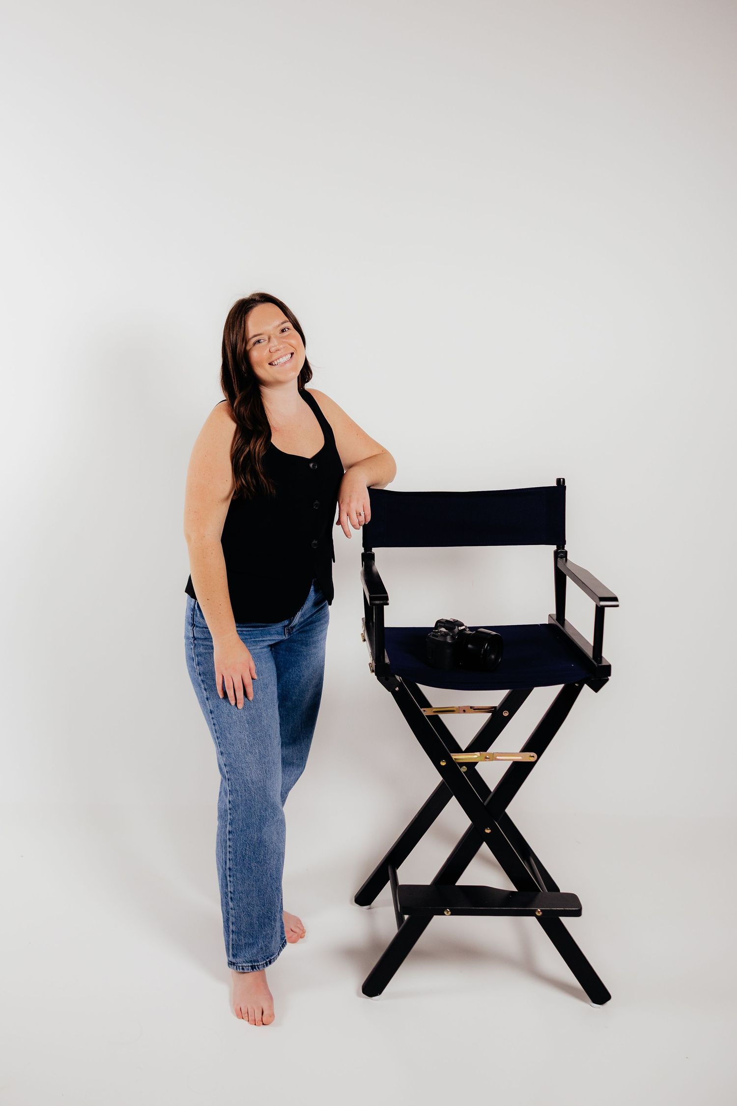 Studio photos with a black director's chair against white background.