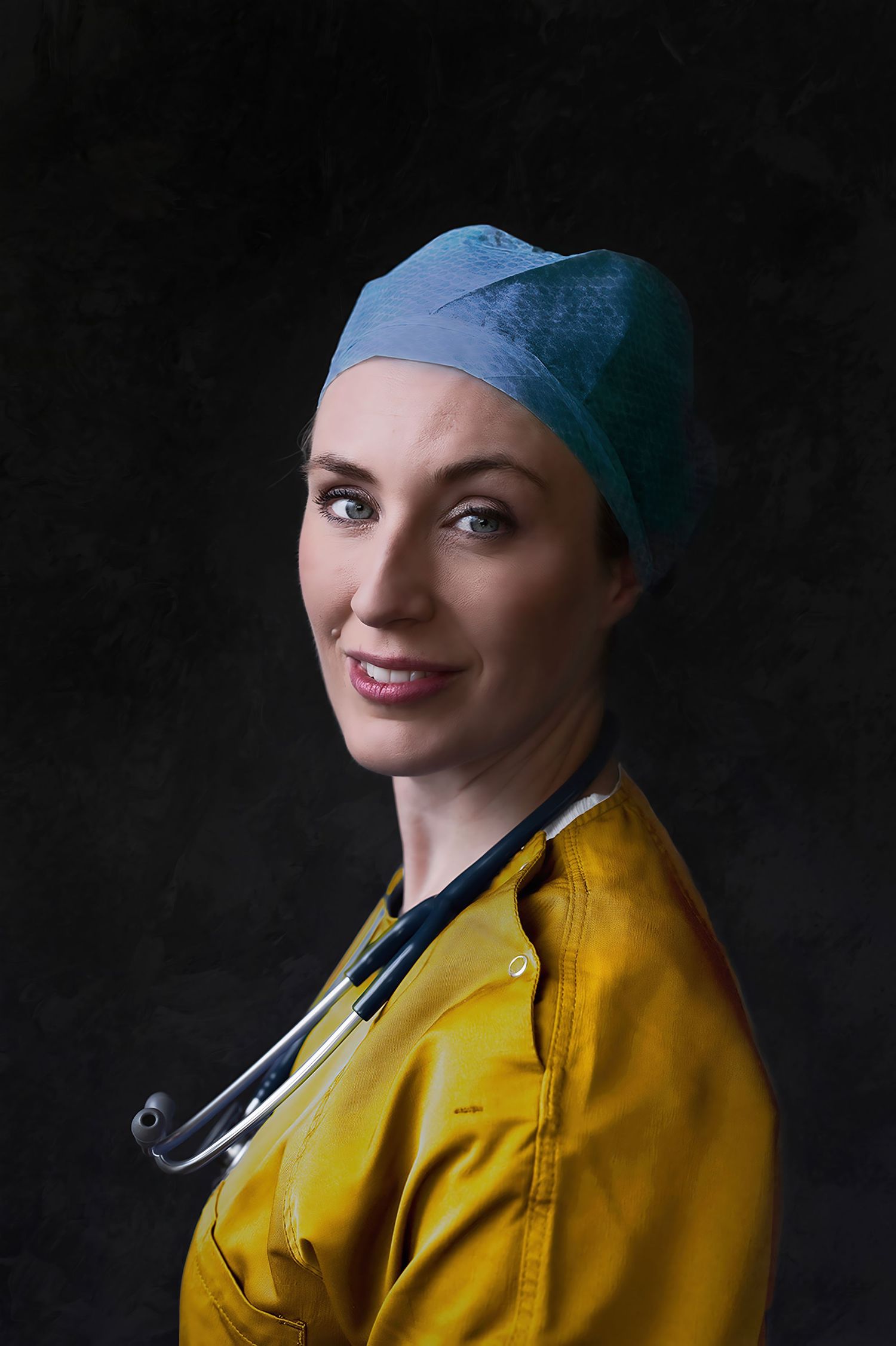 female anesthesiologist in yellow scrubs and blue surgical cap with stethoscope poses like Vermeer's girl with a pearl. By Constanze Ariane