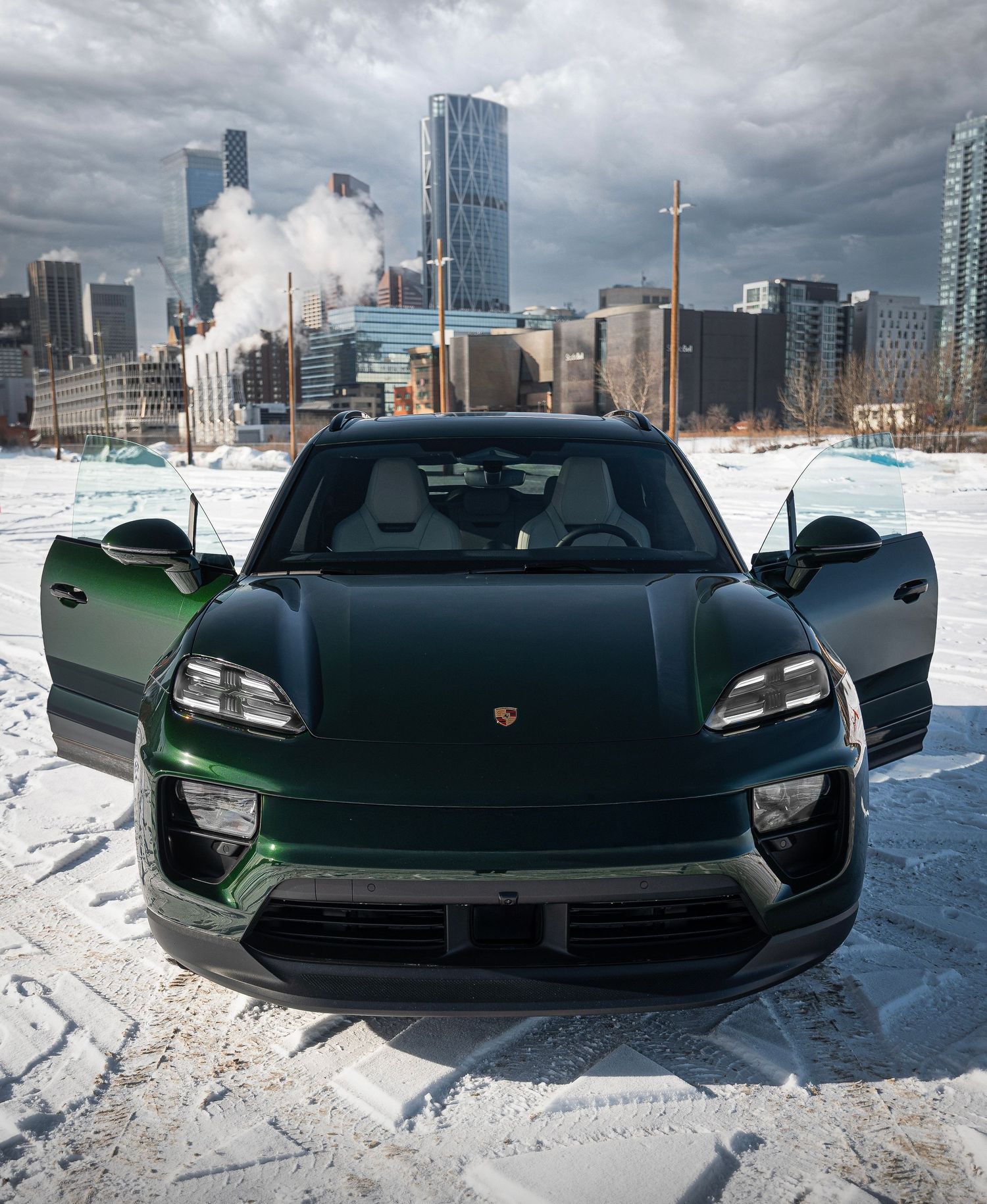 Green EV Porsche Macan in Downtown Calgary